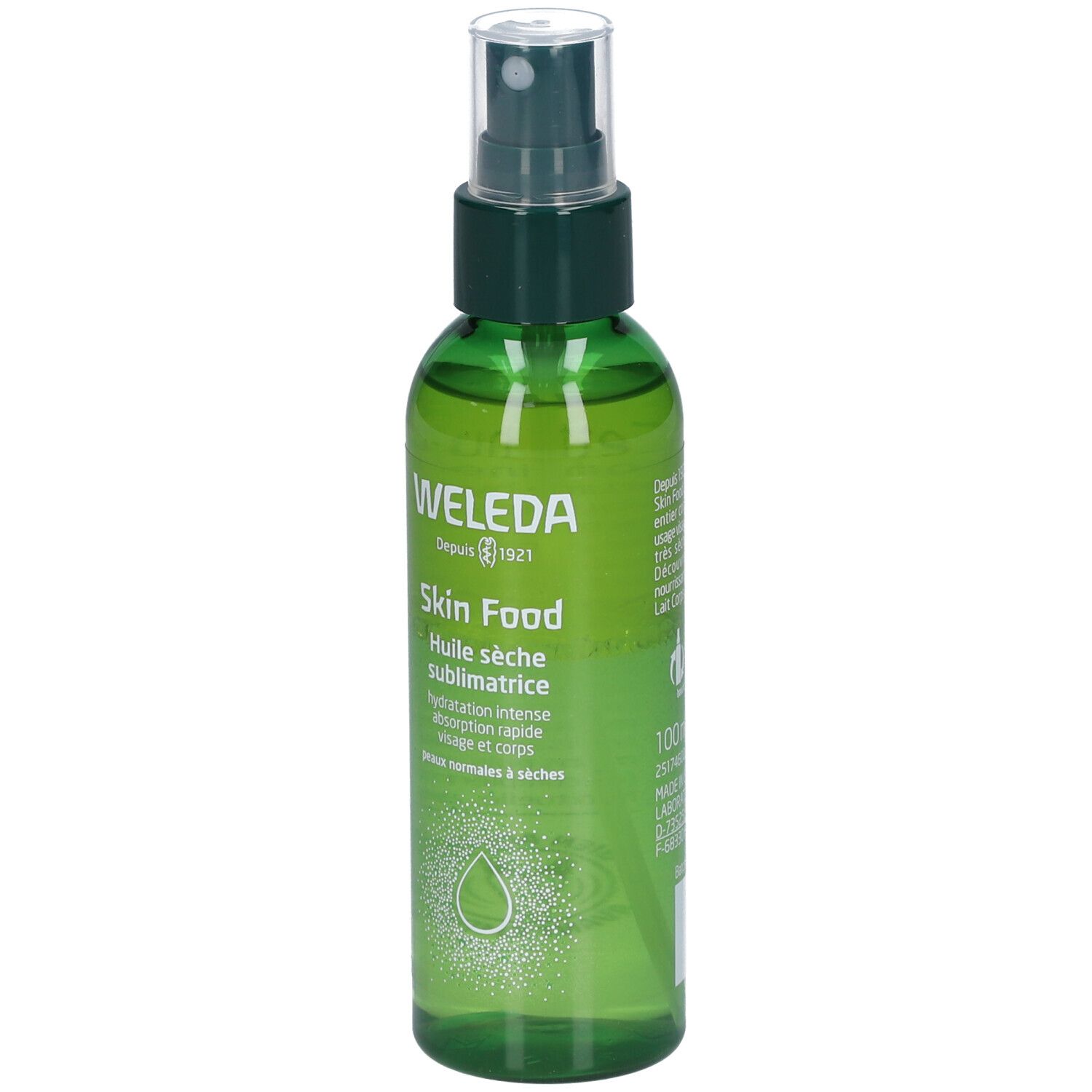 Flacon spray vert WELEDA Skin Food. Liquide clair, bouchon vert. Texte: Huile sèche sublimatrice.