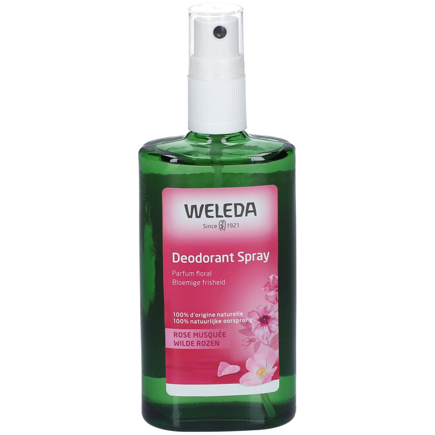 Grüne Glasflasche mit weißem Sprühkopf. Etikett mit Produktnamen und Rosenabbildung. Marke: Weleda.