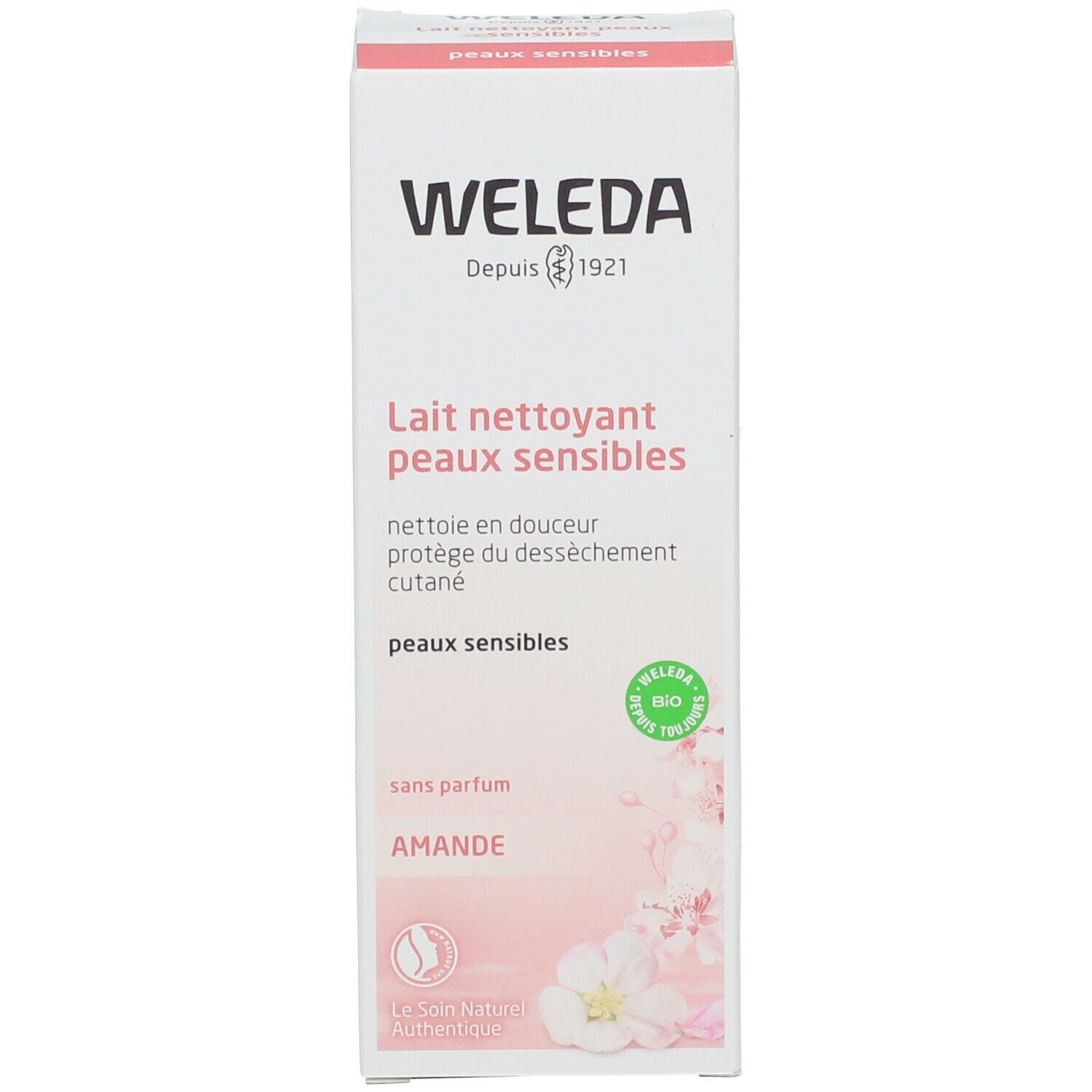Boîte avec texte et motif floral. Inscription: WELEDA, Lait nettoyant peaux sensibles, sans parfum, Amande. Logo: Bio.