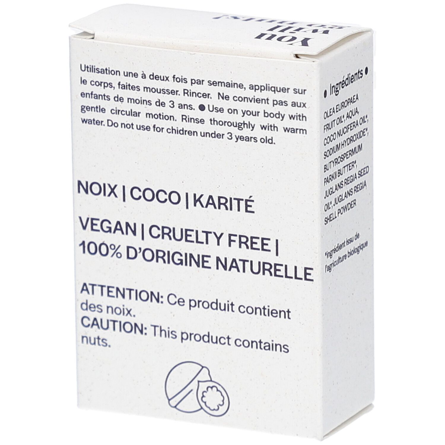 Weiße Kartonverpackung. Aufschrift: NOIX | COCO | KARITÉ, VEGAN | CRUELTY FREE | 100% D'ORIGINE NATURELLE. Enthält Nüsse. Gebrauchsanweisung.