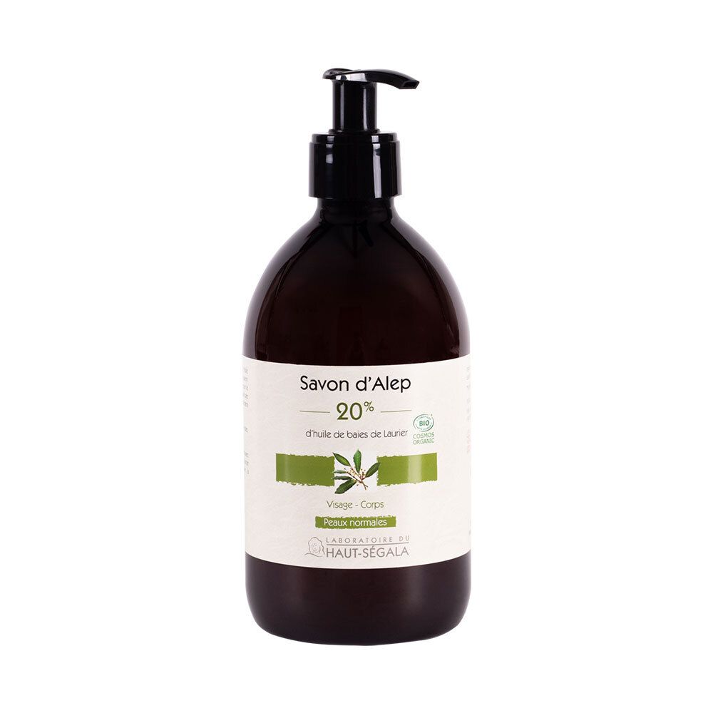 Braune Flasche mit schwarzem Pumpkopf. Etikett mit Text: Savon d'Alep 20%, d'huile de baies de Laurier. Bio-Siegel.