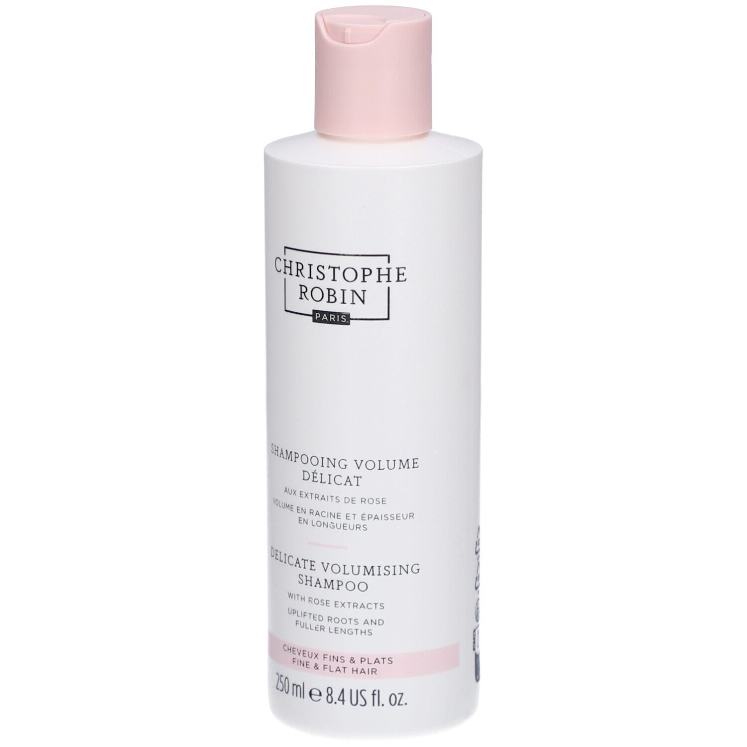 Weiße Flasche mit rosa Verschluss. Aufschrift: Christophe Robin Paris. Text: Shampooing Volume Délicat, Delicate Volumising Shampoo.