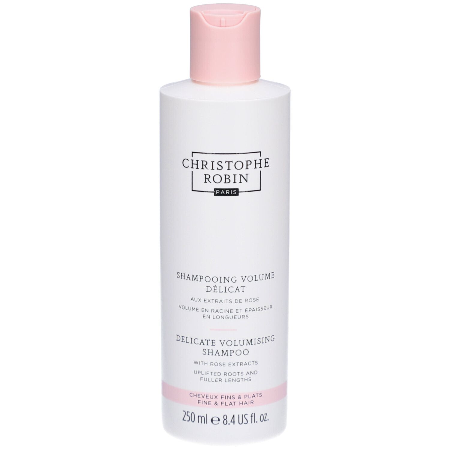 Weiße Flasche mit rosa Verschluss. Aufschrift: Christophe Robin Paris. Text: Shampooing Volume Délicat, Delicate Volumising Shampoo.