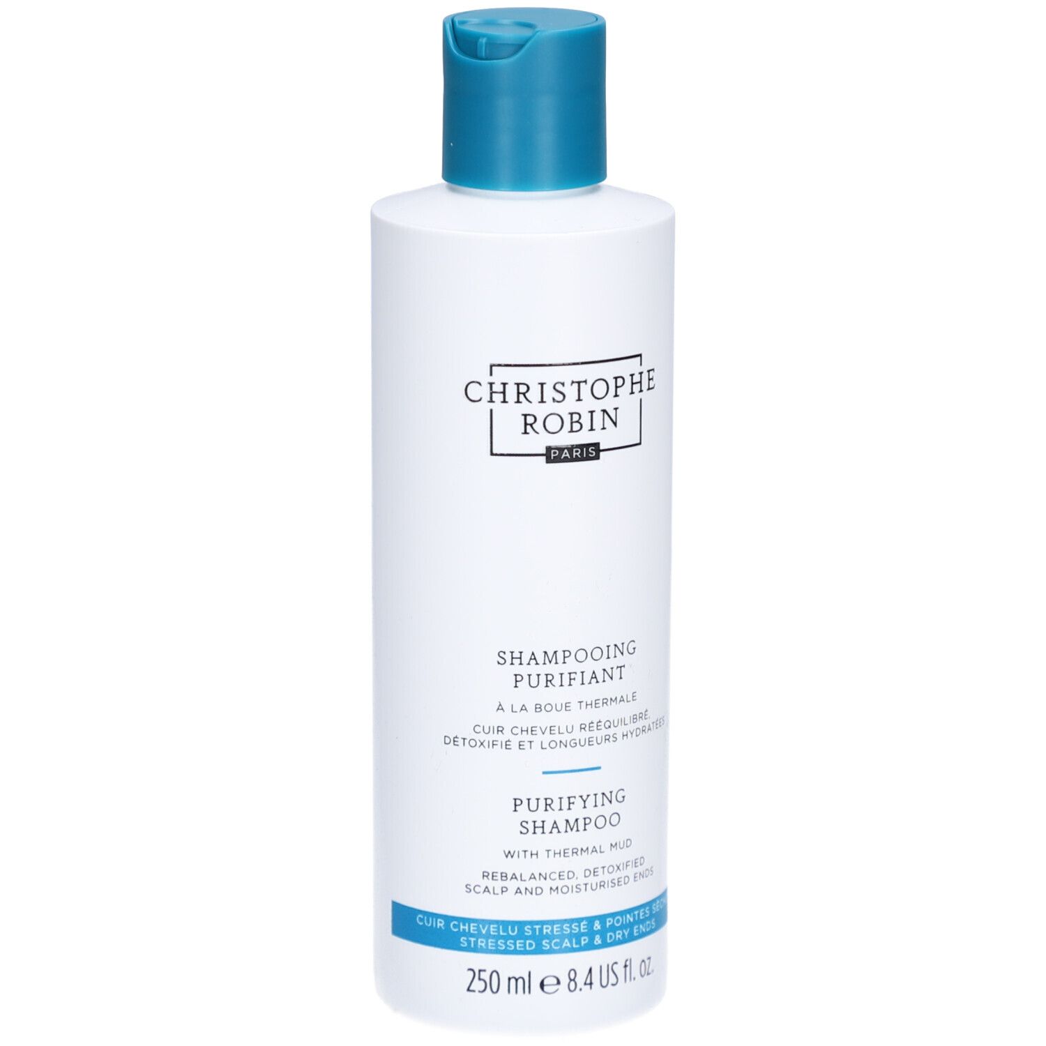 Weiß-blaue Shampoo-Flasche. Aufschrift: Christophe Robin, Shampooing Purifiant, 250 ml.