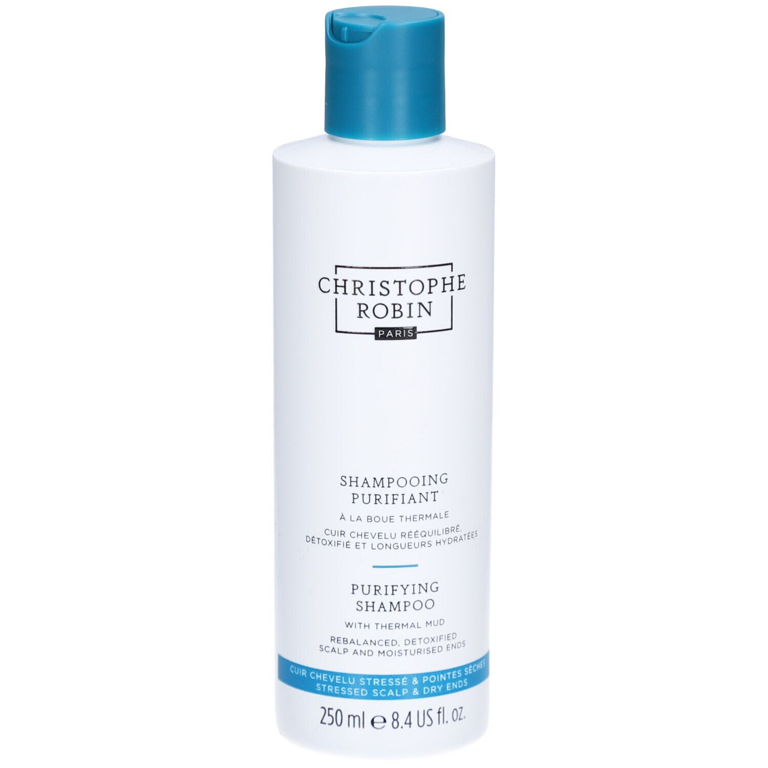 Weiß-blaue Shampoo-Flasche. Aufschrift: Christophe Robin, Shampooing Purifiant, 250 ml.