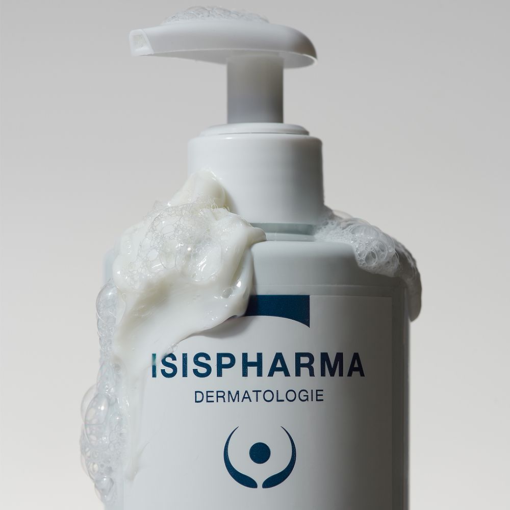 Flacon blanc avec pompe et mousse. Inscription: ISISPHARMA, Dermatologie.