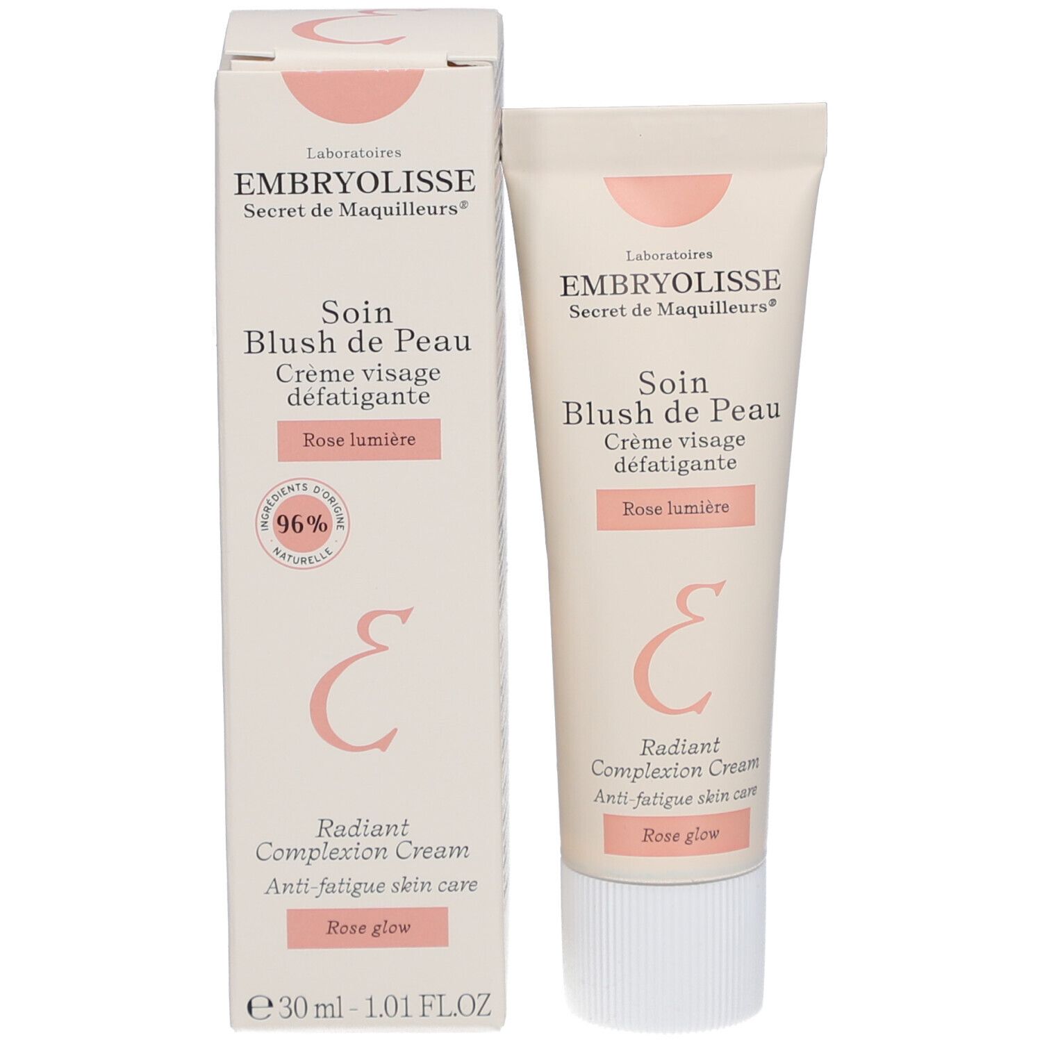 Emballage du produit avec tube et boîte. Tube et boîte affichent le nom du produit et la marque. Écriture rose.