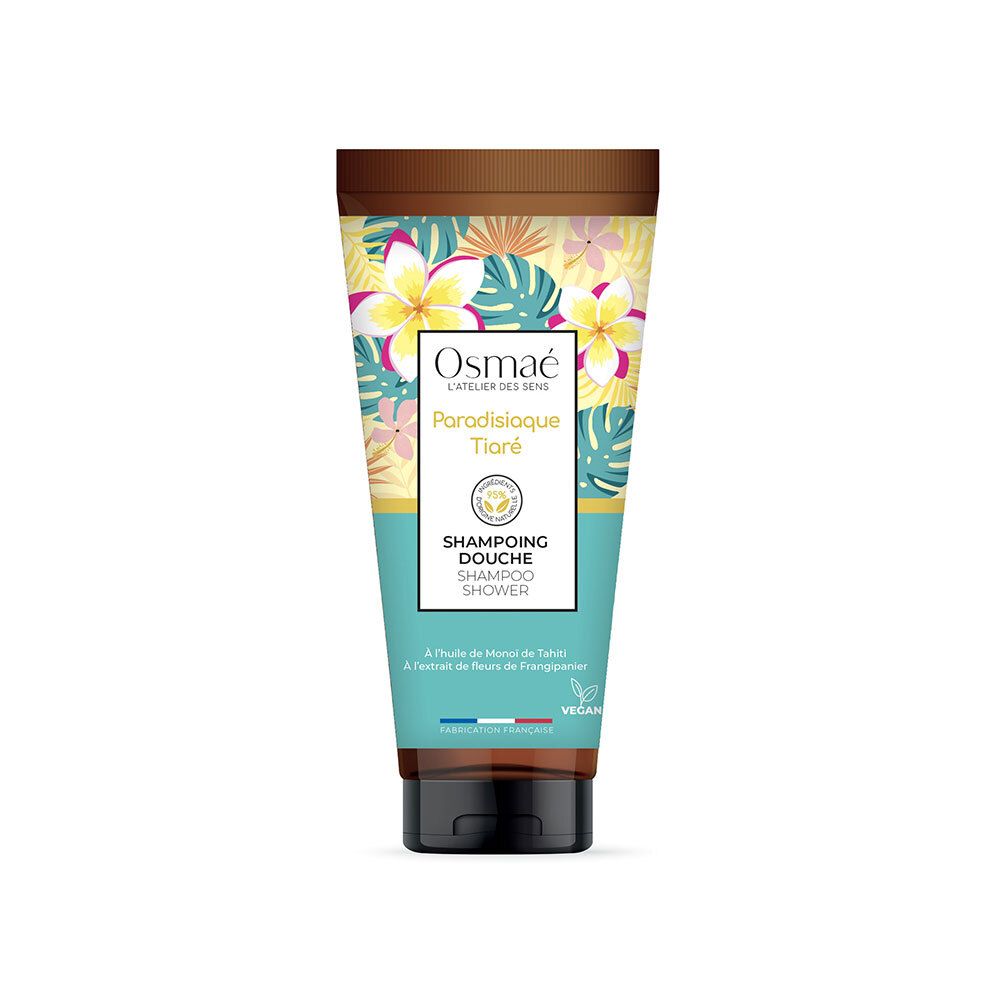 Tube mit floralem Design. Oben braun, unten türkis. Text: Osmaé, Paradisiaque Tiaré, Shampoo Douche, Vegan-Siegel.