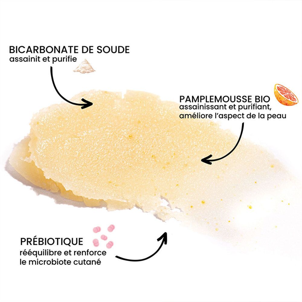 Gros plan sur les ingrédients. Flèches pointent vers Bicarbonate de soude, Pamplemousse Bio et Prébiotique.