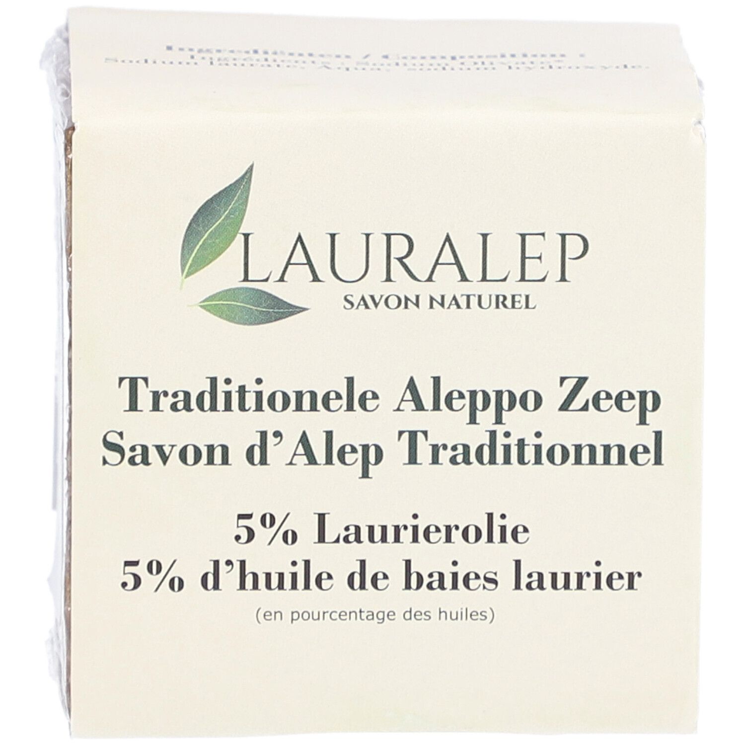 Verpackte Seife. Auf der Verpackung steht LAURALEP, Savon Naturel, Traditionele Aleppo Zeep, 5% Laurierolie.