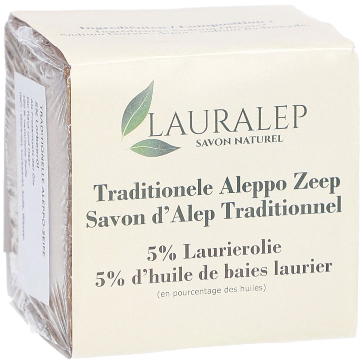 Verpackte Seife. Auf der Verpackung steht LAURALEP, Savon Naturel, Traditionele Aleppo Zeep, 5% Laurierolie.