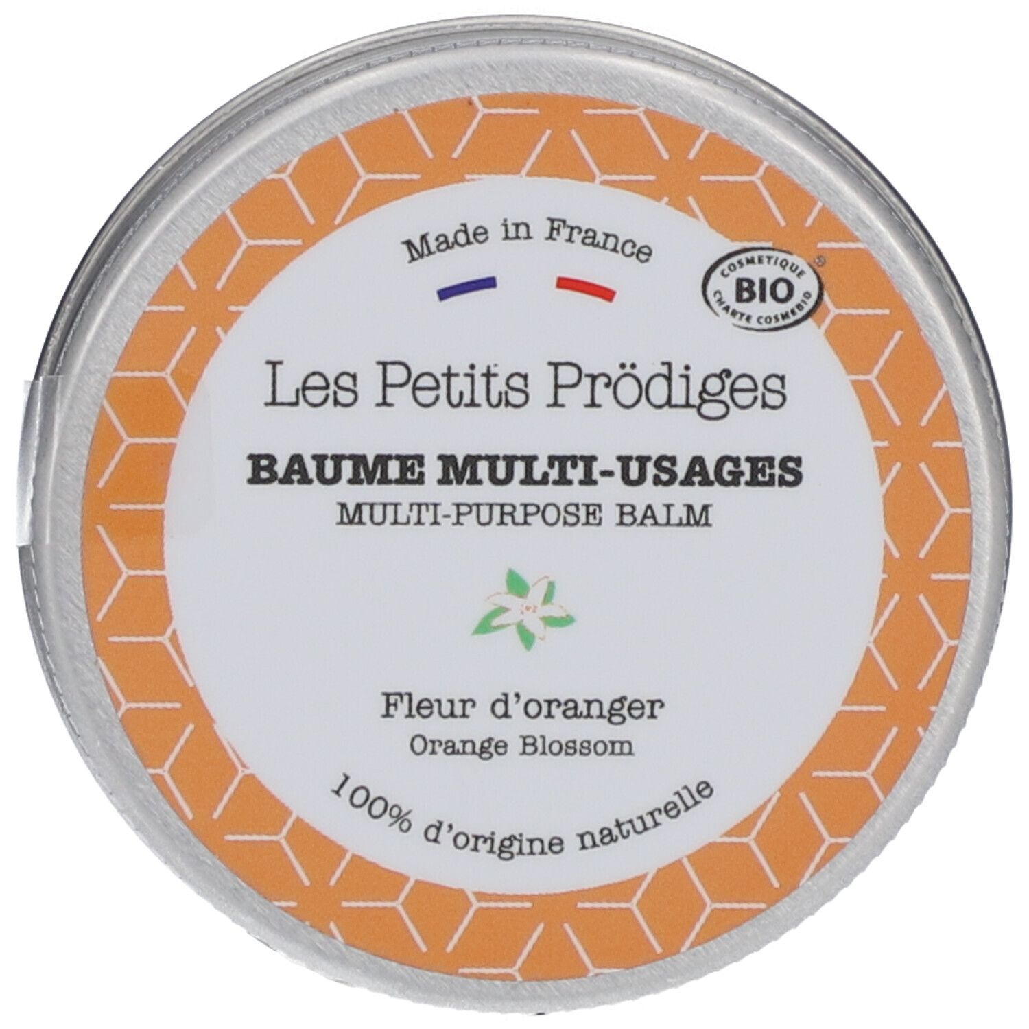 Boîte ronde avec couvercle. Inscription: Les Petits Prödiges, Baume Multi-Usages, Fleur d'oranger. Certification bio.