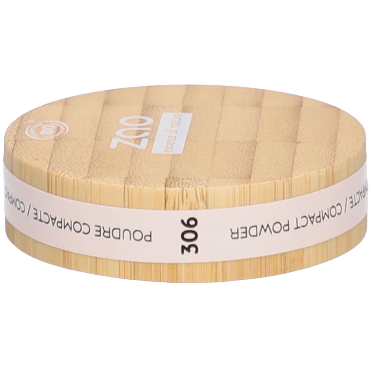 Boîtier rond de poudre compacte en bois. Inscriptions : ZAO, essence of nature, 306, Poudre Compacte / Compact Powder.