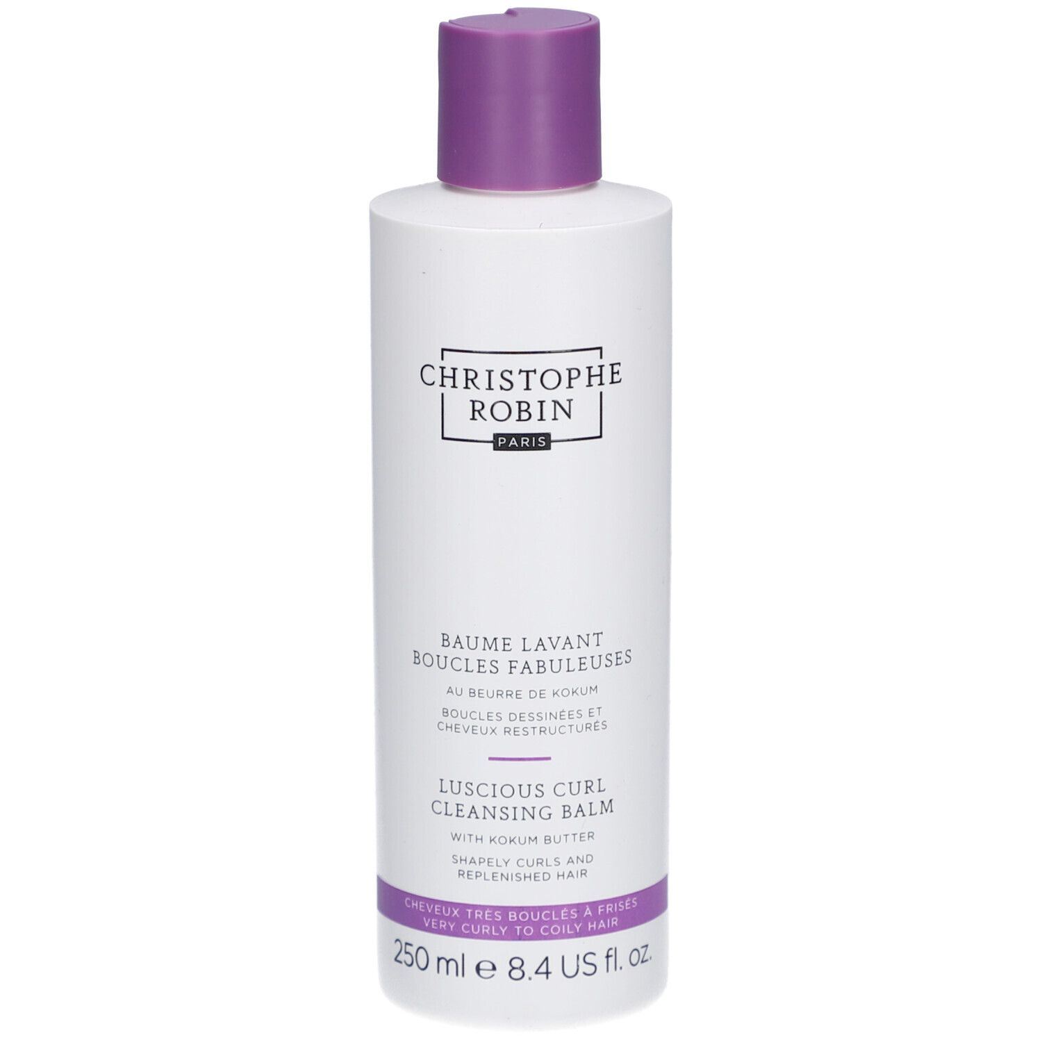 Weißes Shampoo-Fläschchen mit lila Deckel. Aufschrift: Christophe Robin Paris. Text: Baume Lavant Boucles Fabuleuses.