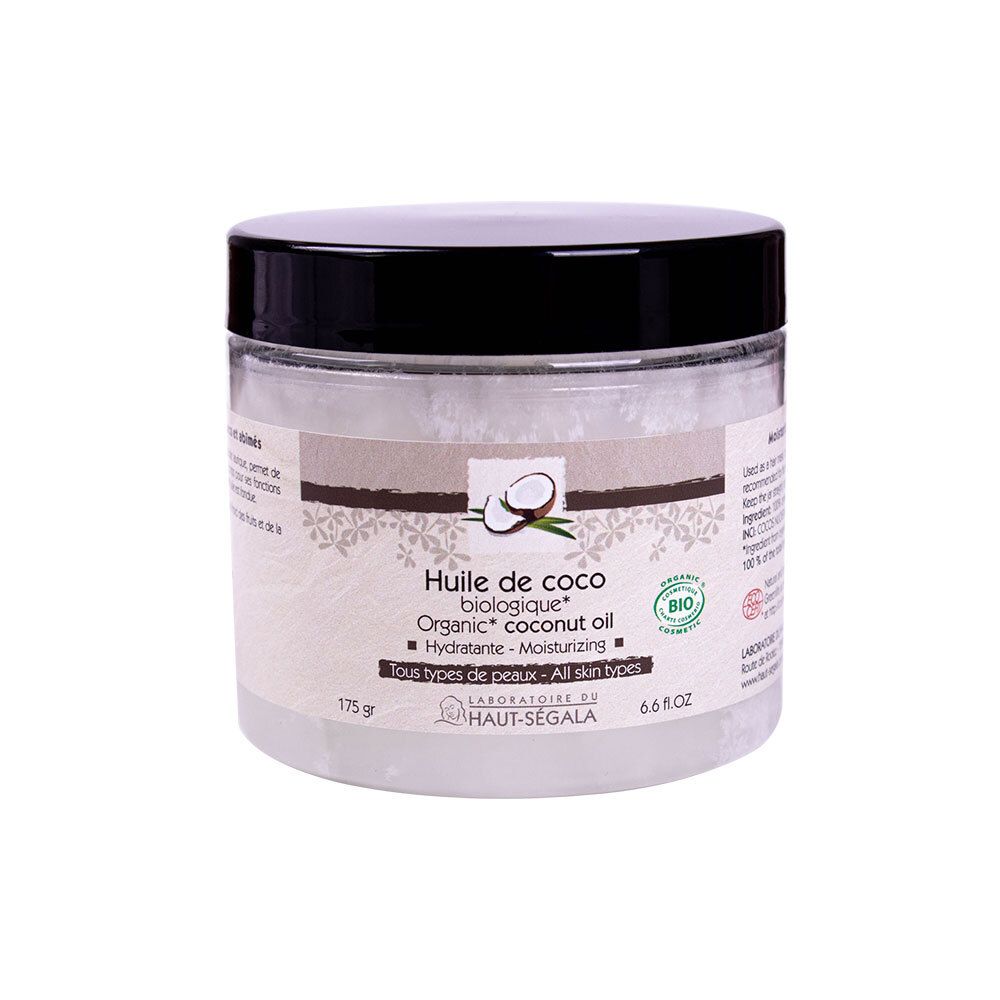 Glas mit Kokosöl. Schwarzer Deckel, weißes Etikett mit Produktinformationen und Bio-Siegel. 175 g, 6.6 fl.oz.