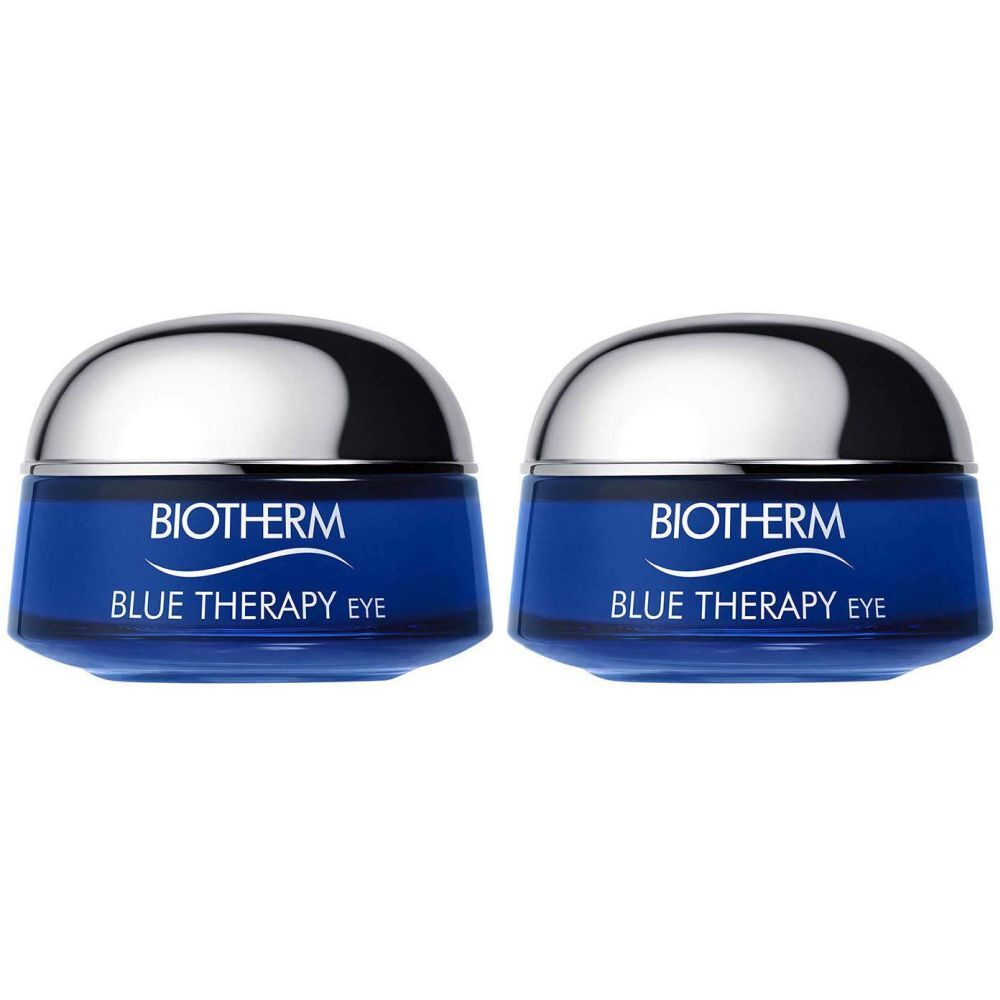 Zwei blaue Tiegel mit silbernen Deckeln. Auf der Vorderseite steht "BIOTHERM BLUE THERAPY EYE".