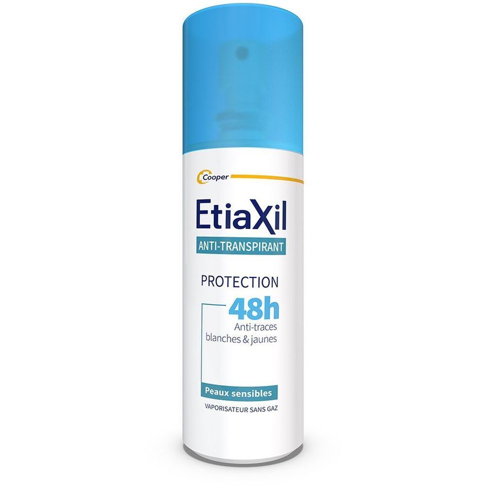 Spray anti-transpirant avec bouchon bleu. Nom du produit et caractéristiques sur l'étiquette.