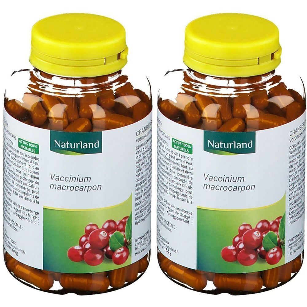 Zwei Flaschen mit gelben Deckeln. Auf den Etiketten steht "Naturland" und "Vaccinium macrocarpon". Kapseln sind sichtbar.