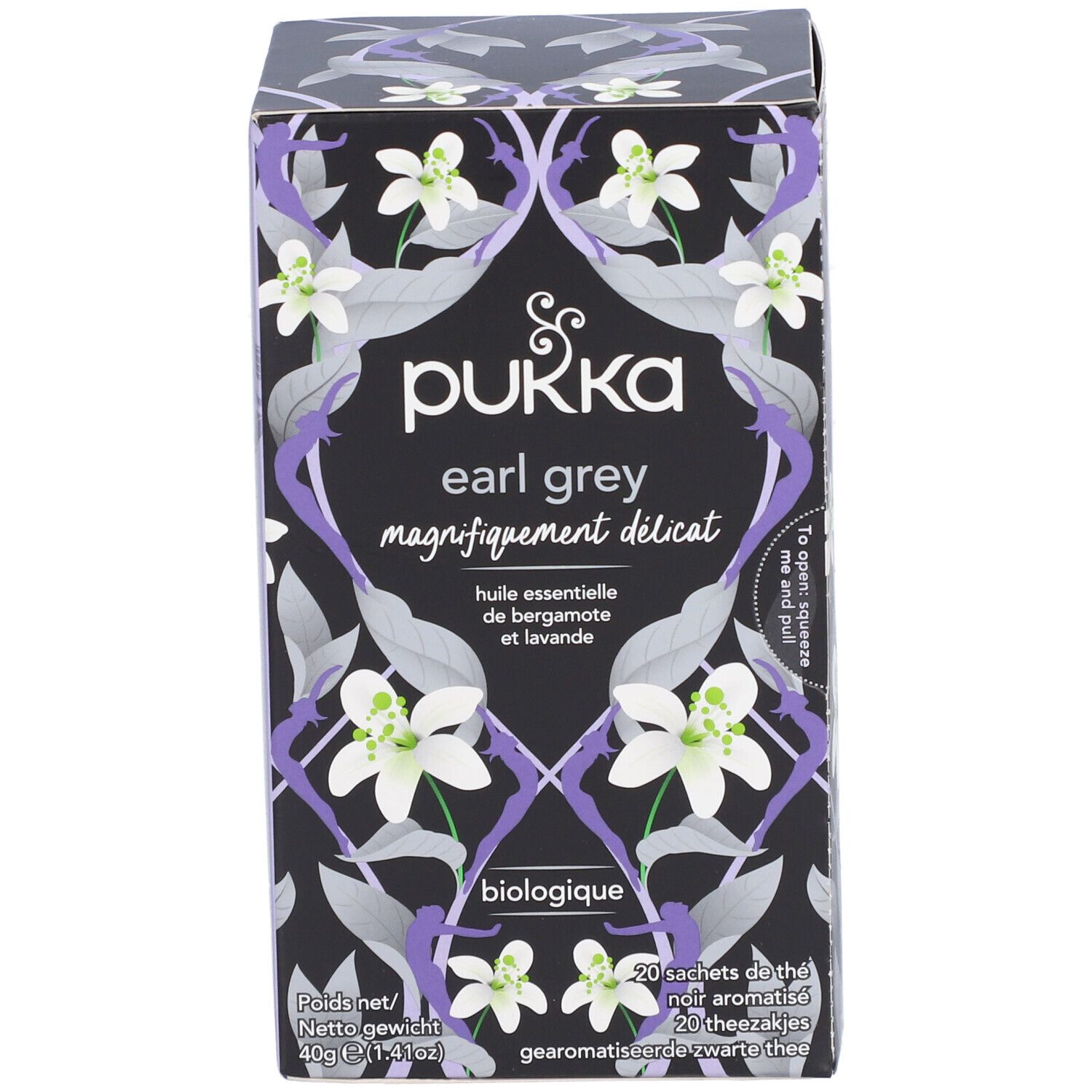 Pukka Earl Grey Teebox. Schwarzer Hintergrund mit floralem Muster und Produktbezeichnung. Biologisch.