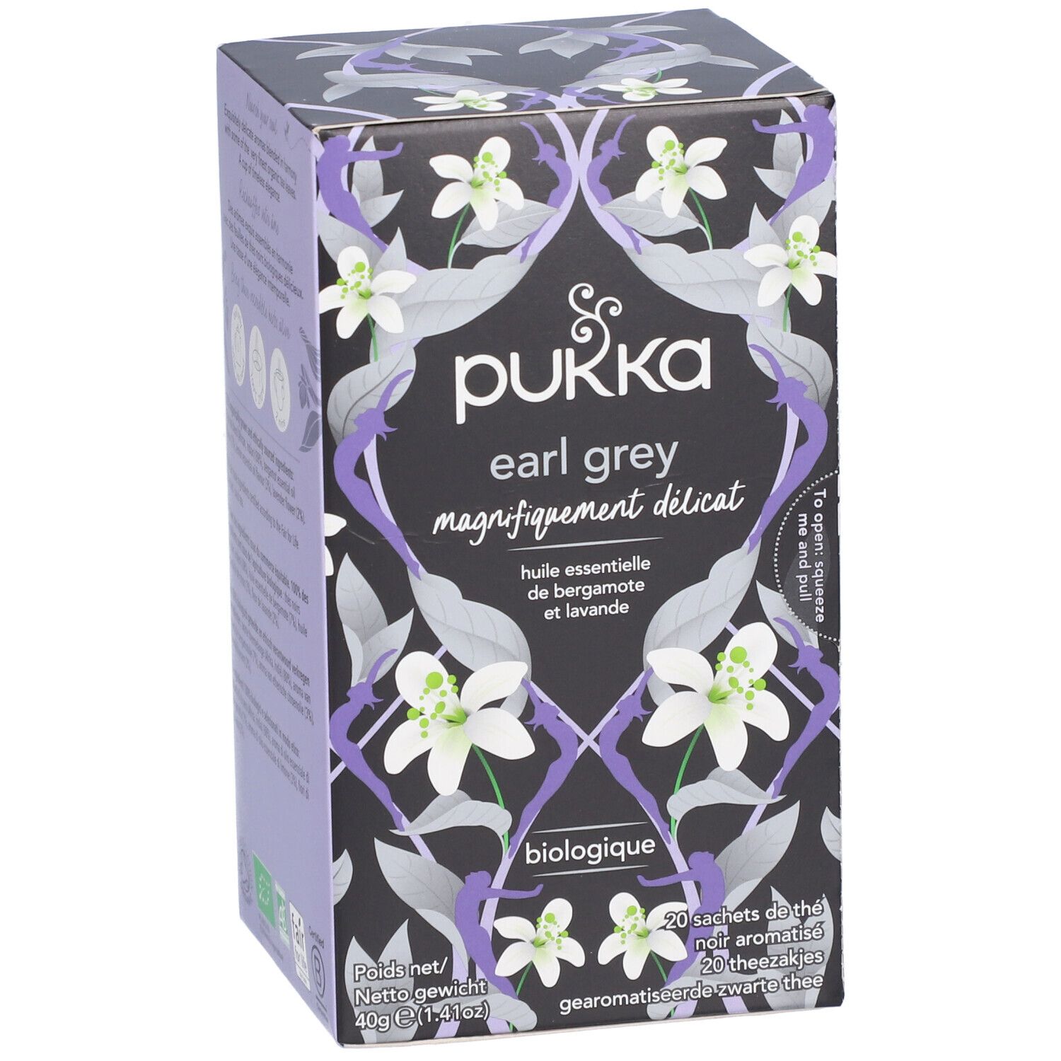 Pukka Earl Grey Teebox. Lila Hintergrund mit floralem Muster und Produktbezeichnung. Biologisch.