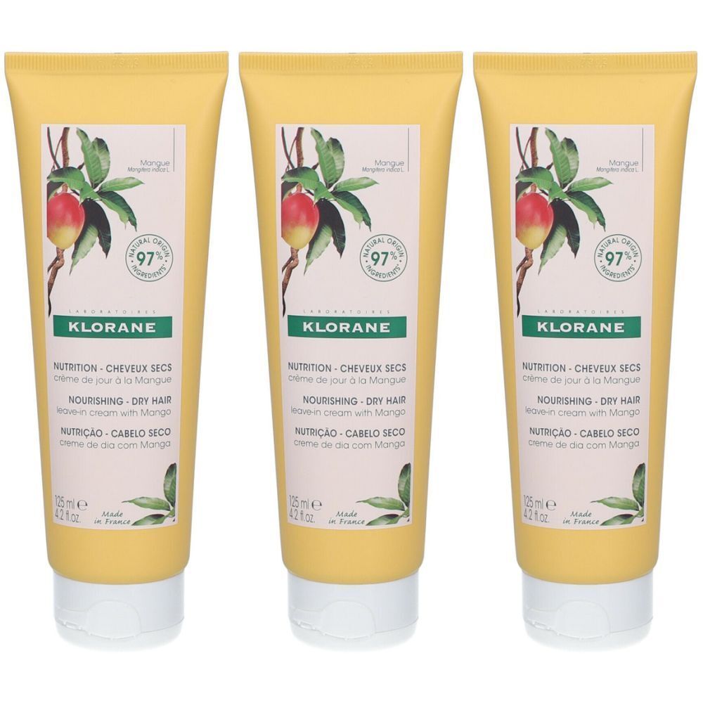 Trois tubes de crème de jour à la Mangue KLORANE. Tubes jaunes avec illustration de mangue et texte. Inscription: Nourishing Dry Hair Leave-in Cream.