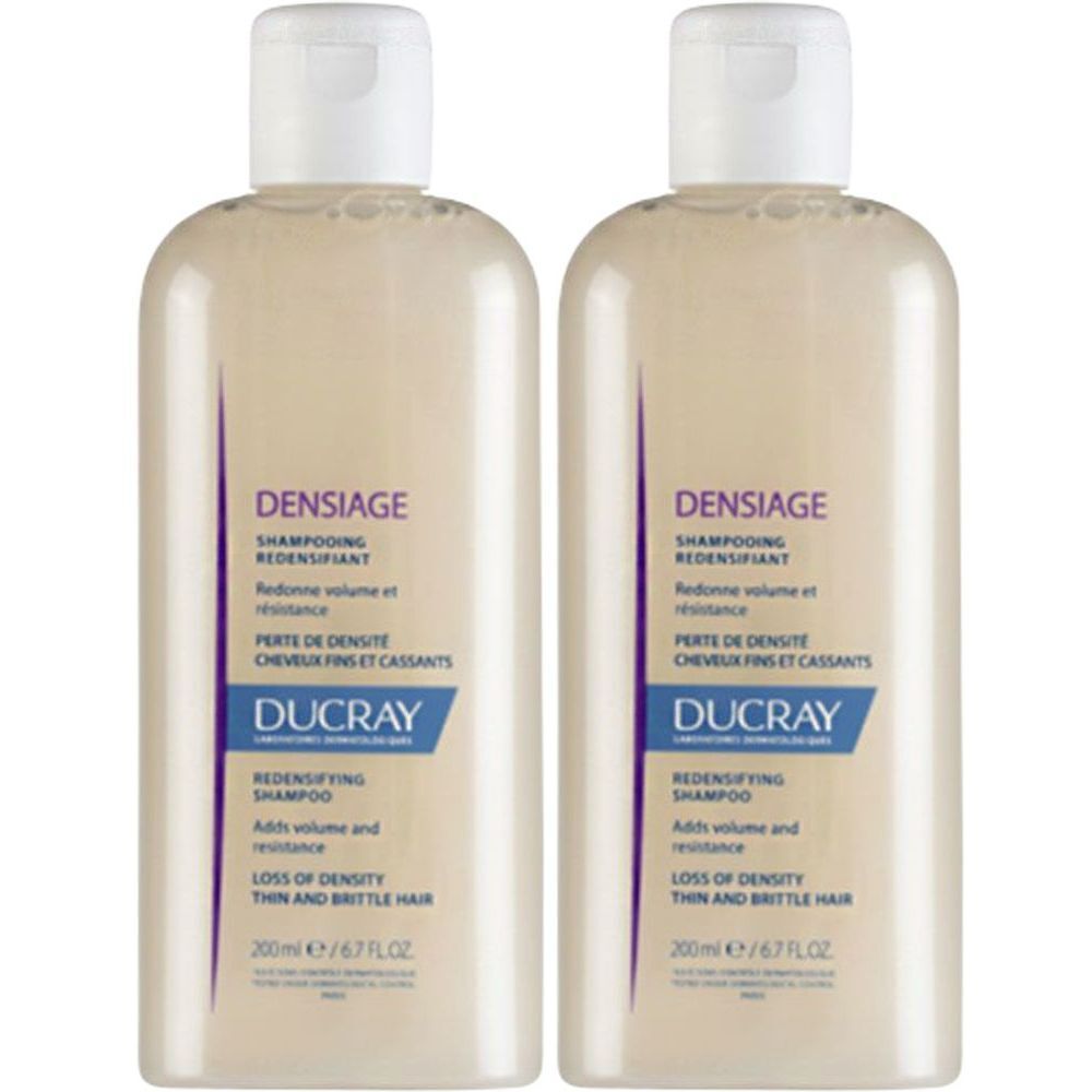 Deux flacons de DUCRAY DENSIAGE Shampooing Redensifiant. Flacons blanc-beige avec bouchon blanc. Texte: DENSIAGE, DUCRAY.