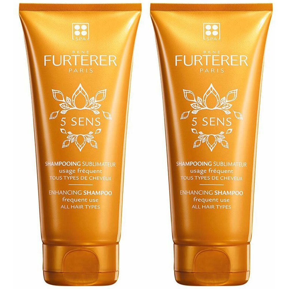 Zwei goldfarbene Tuben Shampoo. Aufschrift: René Furterer Paris, 5 SENS, Shampooing Sublimateur, für alle Haartypen.