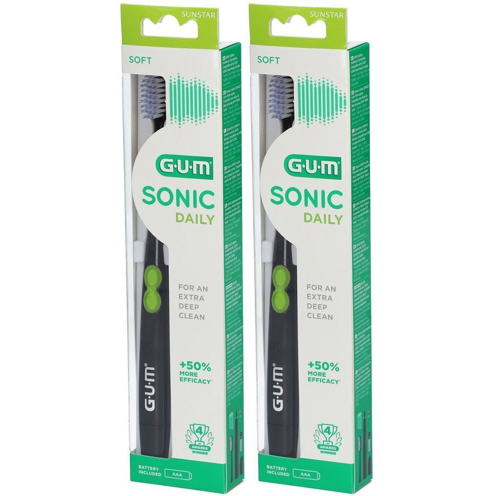 Deux brosses à dents GUM Sonic Daily dans leur emballage. Manche noir, bouton vert, poils souples. Emballage avec nom et logo du produit.