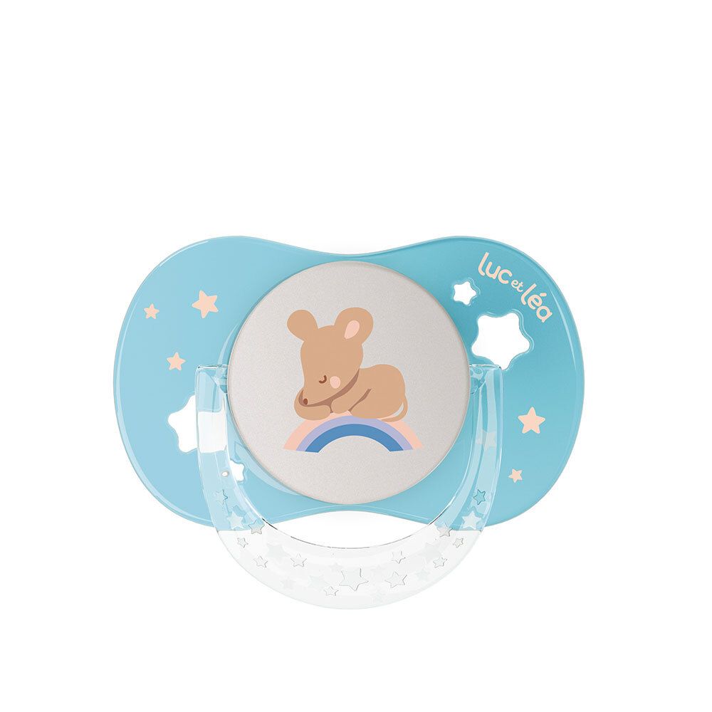Anatomischer Nachtschnuller, blau. Motiv: Bär auf Regenbogen. Marke: Luc et Léa. Mit leuchtendem Knopf.