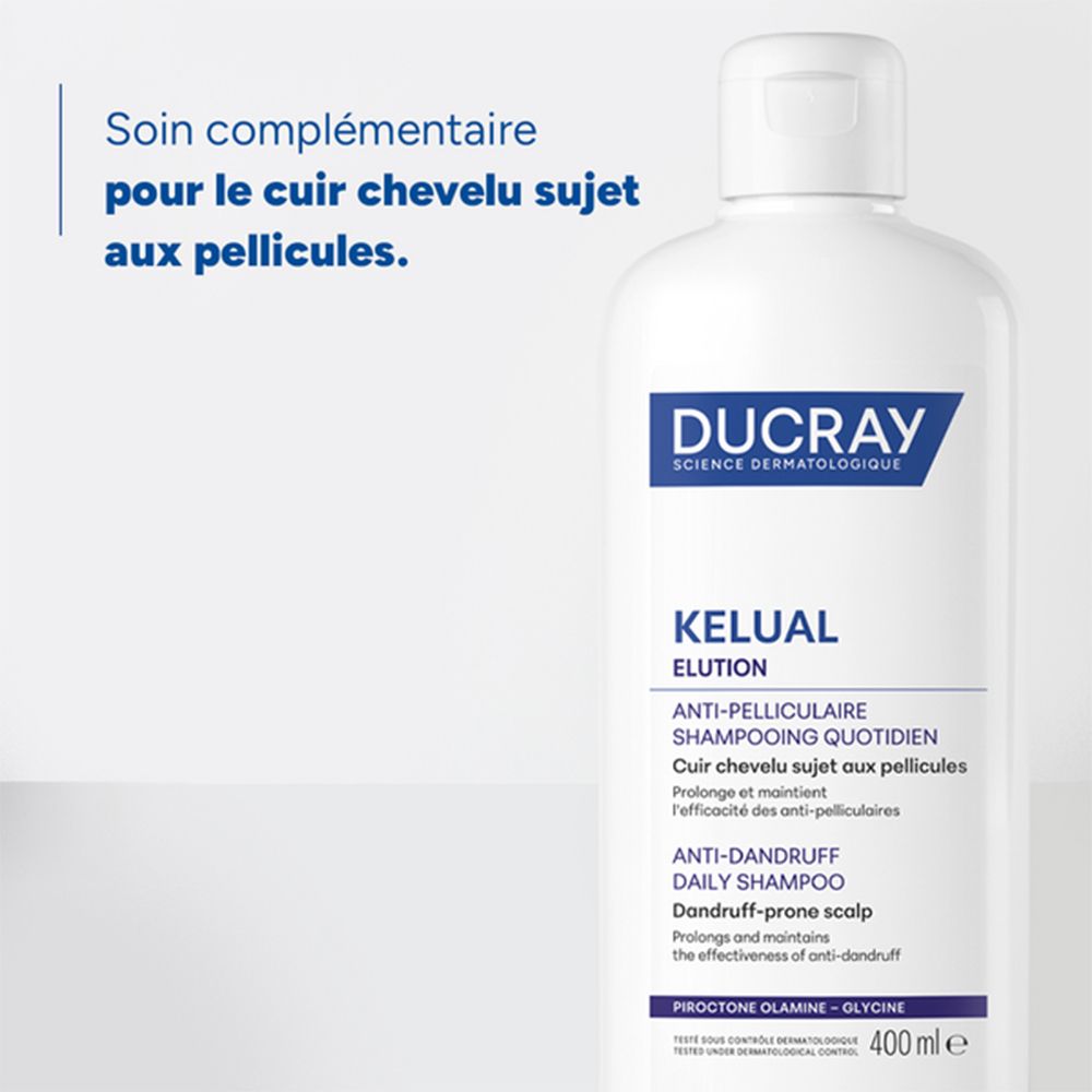 Flacon blanc, étiquette bleue. Inscription: DUCRAY, KELUAL, Shampooing antipelliculaire. 400ml.