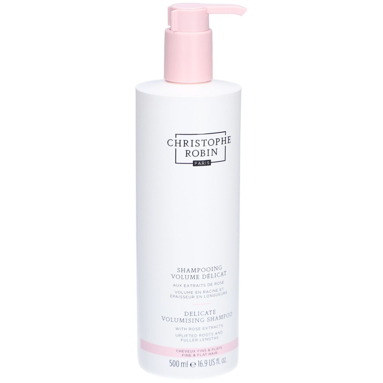 Weiße Flasche mit rosa Pumpe. Aufschrift: CHRISTOPHE ROBIN PARIS. Shampooing Délicat Volume aux Extraits de Rose. 500 ml.