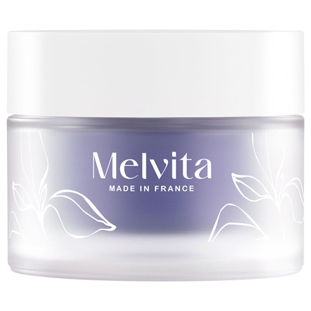 Pot de crème avec couvercle blanc. Melvita, Made in France, est écrit. Décor floral.