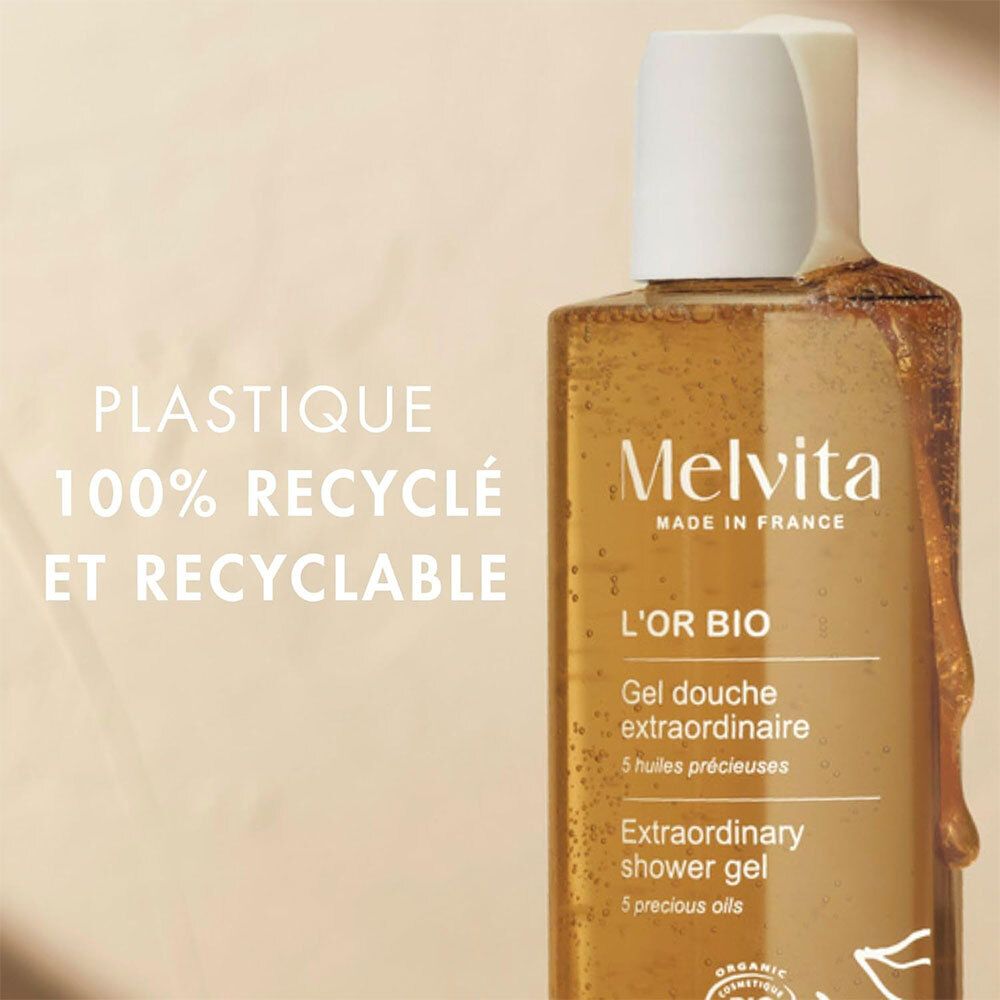Melvita L'Or Bio Gel Douche Extraordinaire. Flasche mit Text: 100% recycelt und recycelbar.