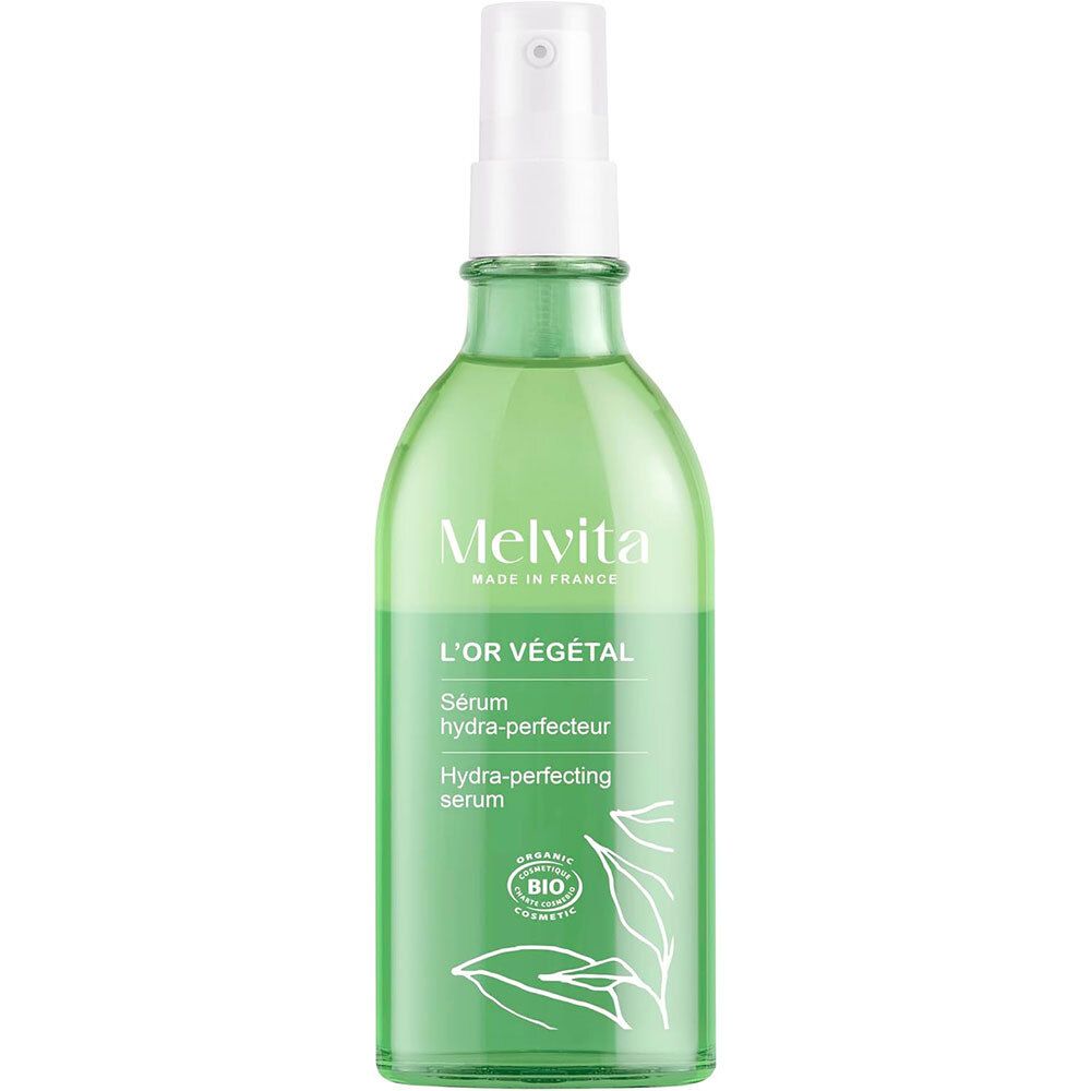 Flacon en verre vert avec vaporisateur. Inscription : Melvita, L'Or Végétal, Sérum hydra-perfecteur, Hydra-perfecting serum. Certification bio.