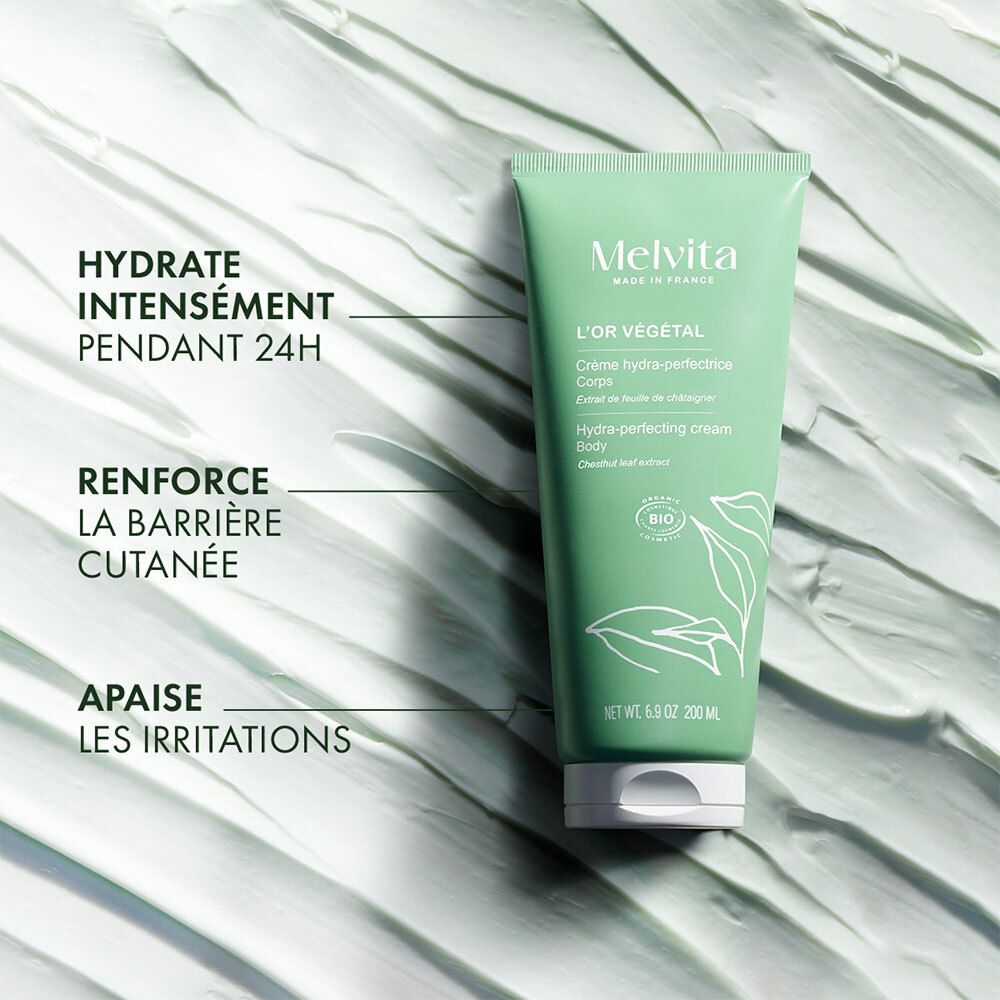 Tube vert MELVITA L'Or Végétal Body Cream sur fond vert. Texte : Hydratation, renforce la barrière cutanée, apaise les irritations.