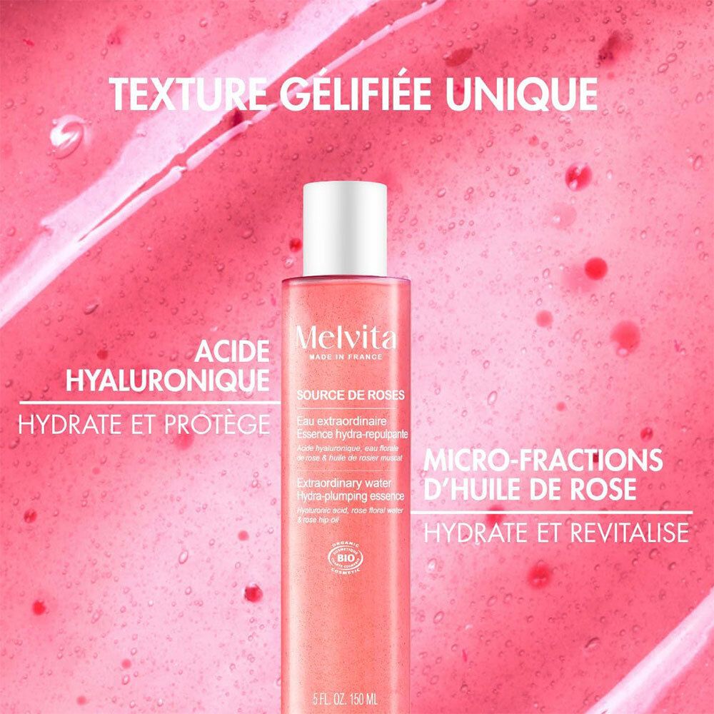 Rosa-Essenzflasche mit weißem Deckel. Text: Acide hyaluronique, hydrate et protège.