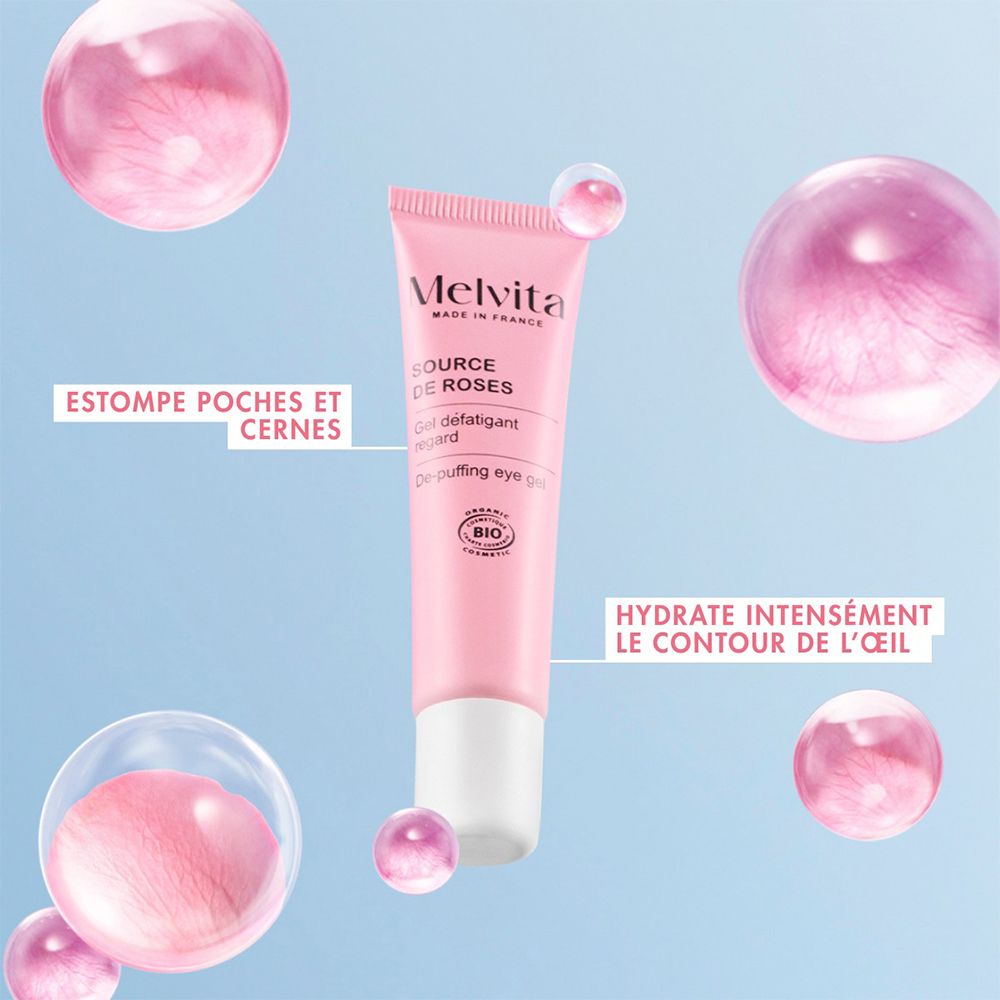 Rosa Augen-Gel-Tube, umgeben von rosa Blasen. Text: Hydratisiert intensiv die Augenkontur.