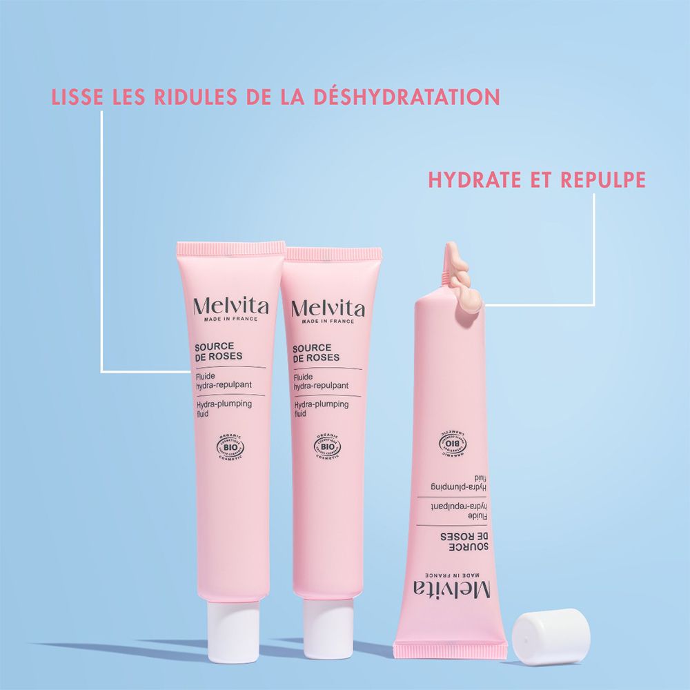 Trois tubes roses Melvita Source de Roses. Un avec produit, un autre, un avec produit extrudé.
