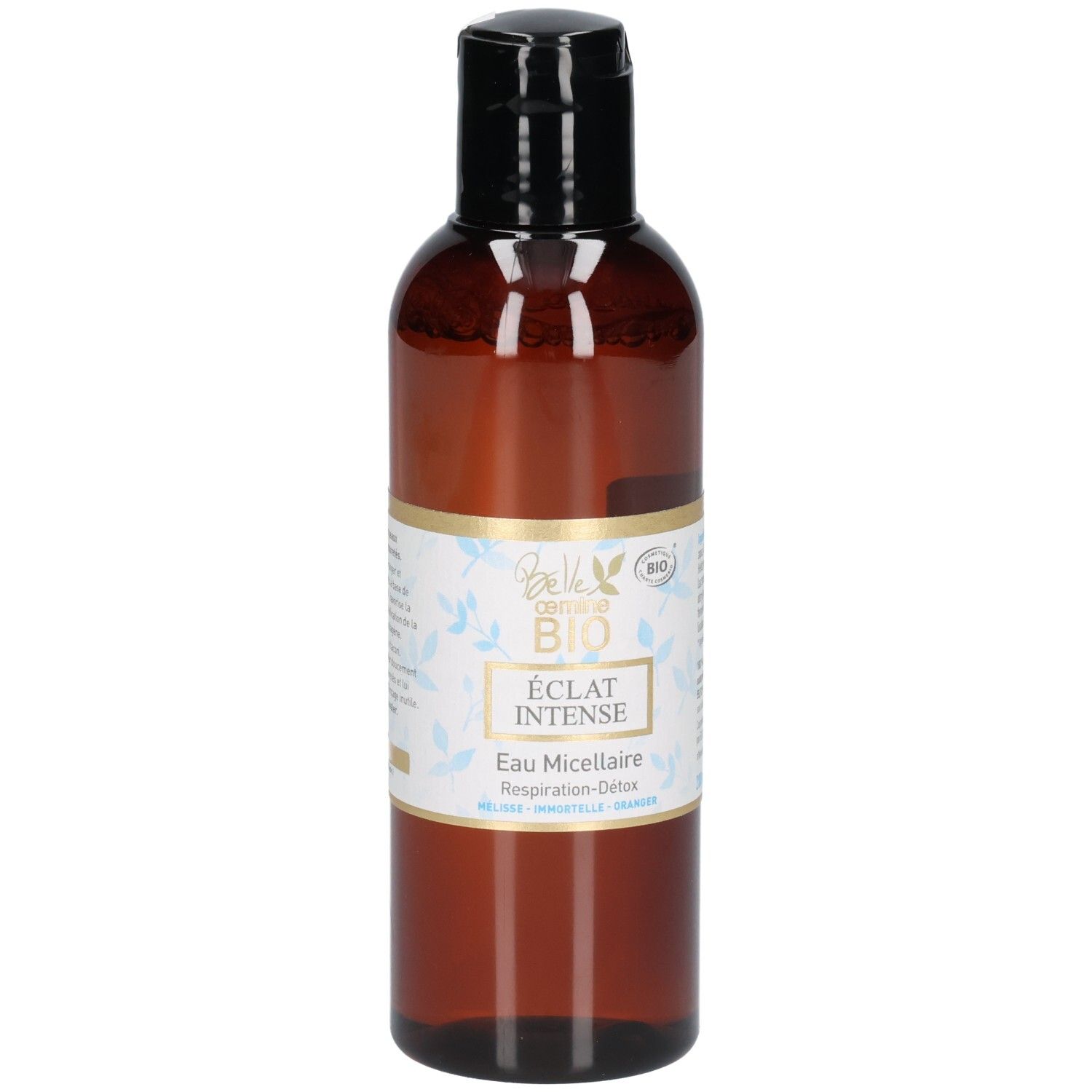 Braune Flasche mit schwarzem Verschluss, Etikett mit BIO-Siegel und floralem Muster.