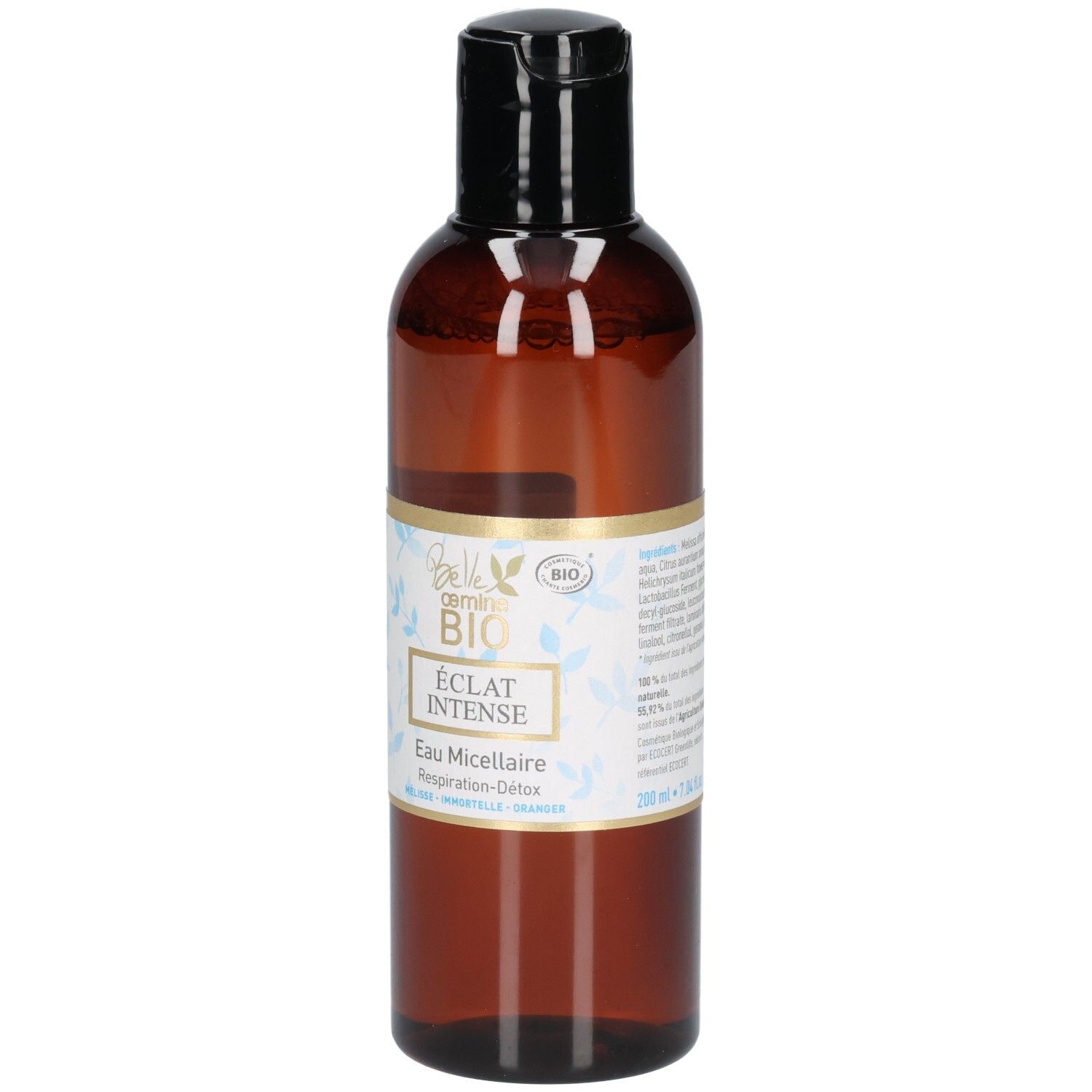 Braune Flasche mit schwarzem Verschluss, Etikett mit BIO-Siegel und floralem Muster.