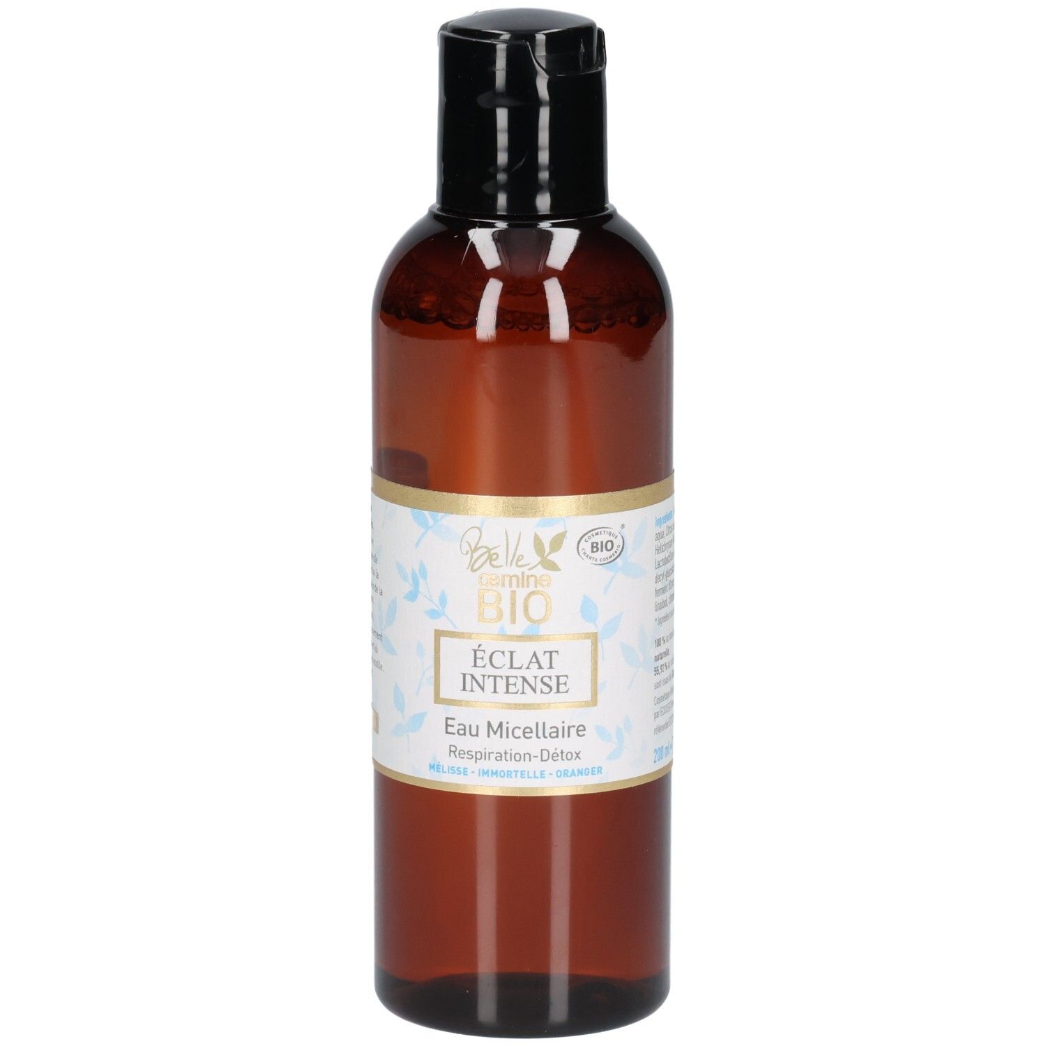 Braune Flasche mit schwarzem Verschluss, Etikett mit BIO-Siegel und floralem Muster.