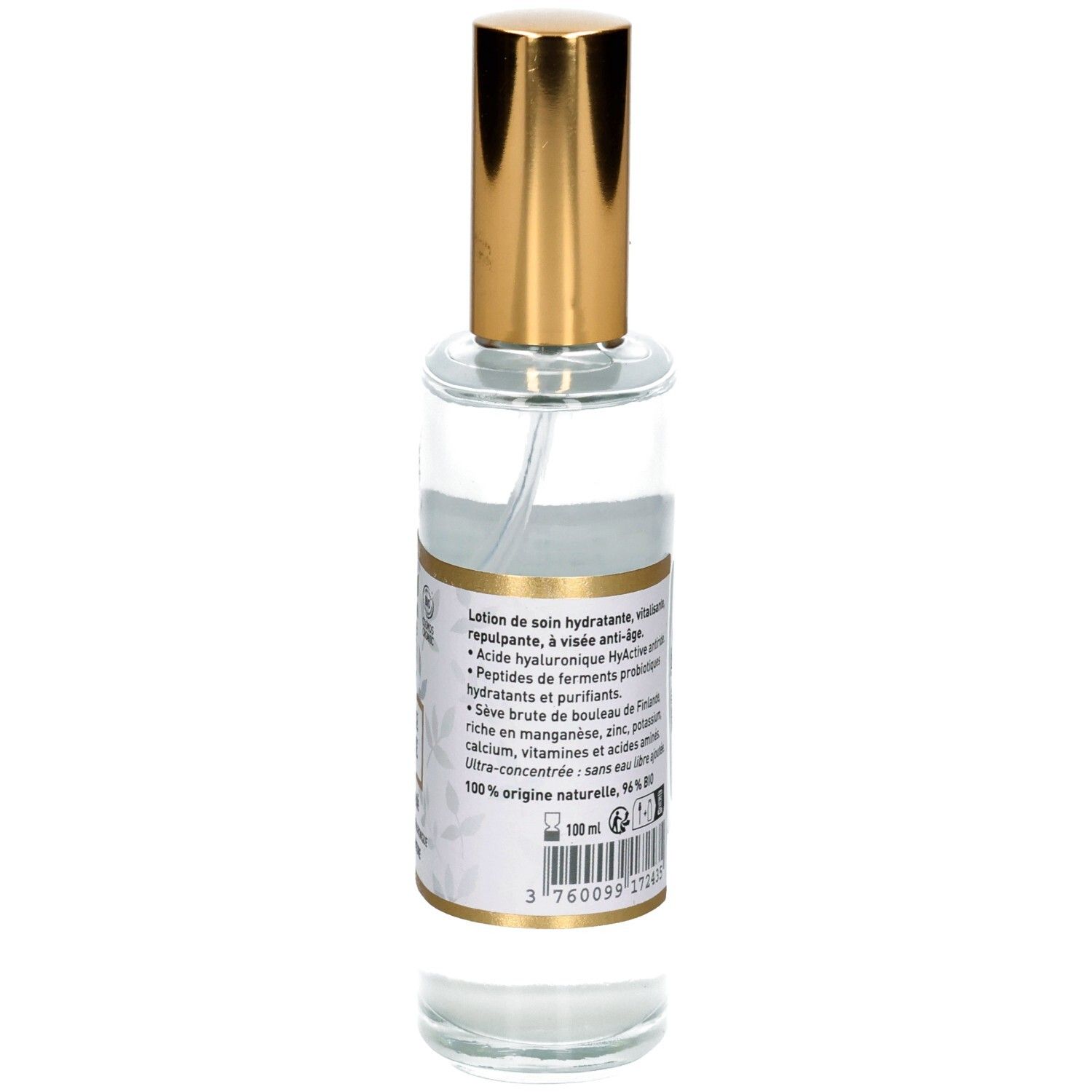 Rückseite einer Glasflasche mit Pumpsprühkopf. Etikett mit Volumenangabe '100 ml'.