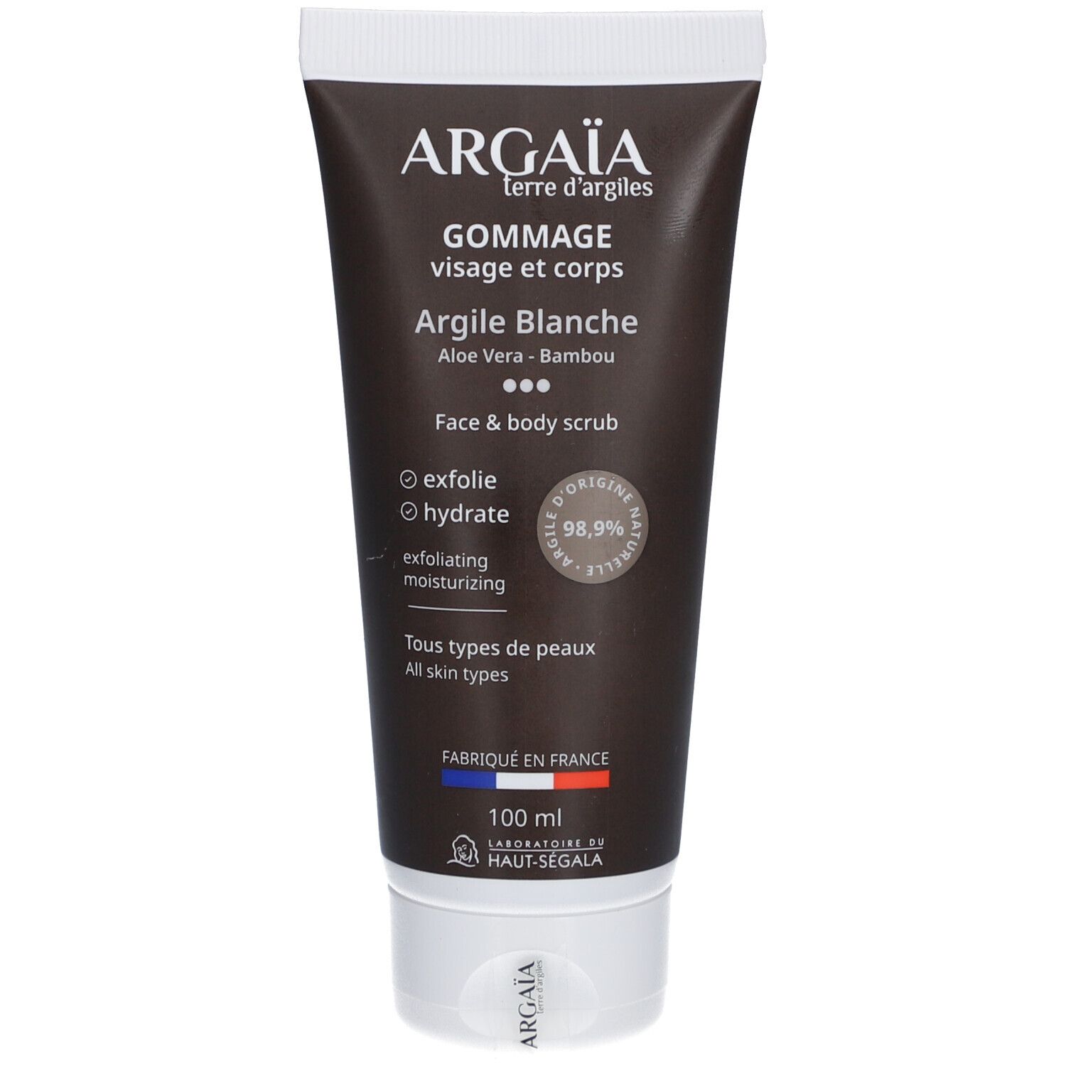 Tube de gommage pour le corps. Tube noir avec bouchon blanc. Texte: Argaia, Gommage Visage et Corps, Argile Blanche, 100 ml.