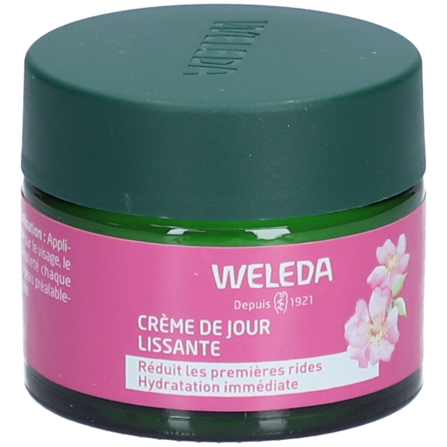 Grünes Glas mit grünem Deckel. Rosa Etikett mit Produktnamen, Blüten und Logo. Text: Crème de Jour Lissante, Hydratation immédiate.