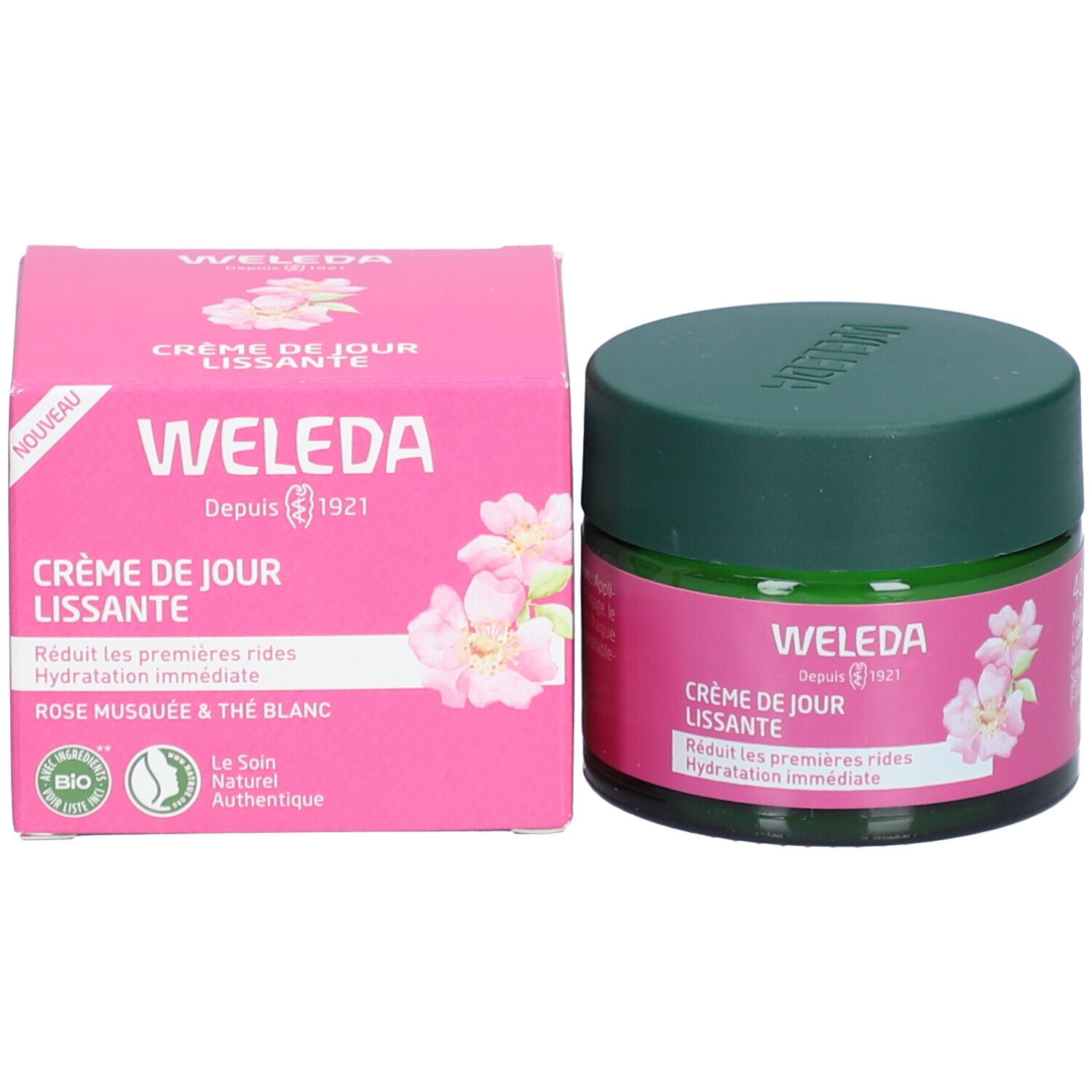 Rosa Schachtel und grünes Glas mit grünem Deckel. Text: Weleda, Crème de Jour Lissante, Rose Musquée & Thé Blanc. Bio-Siegel.