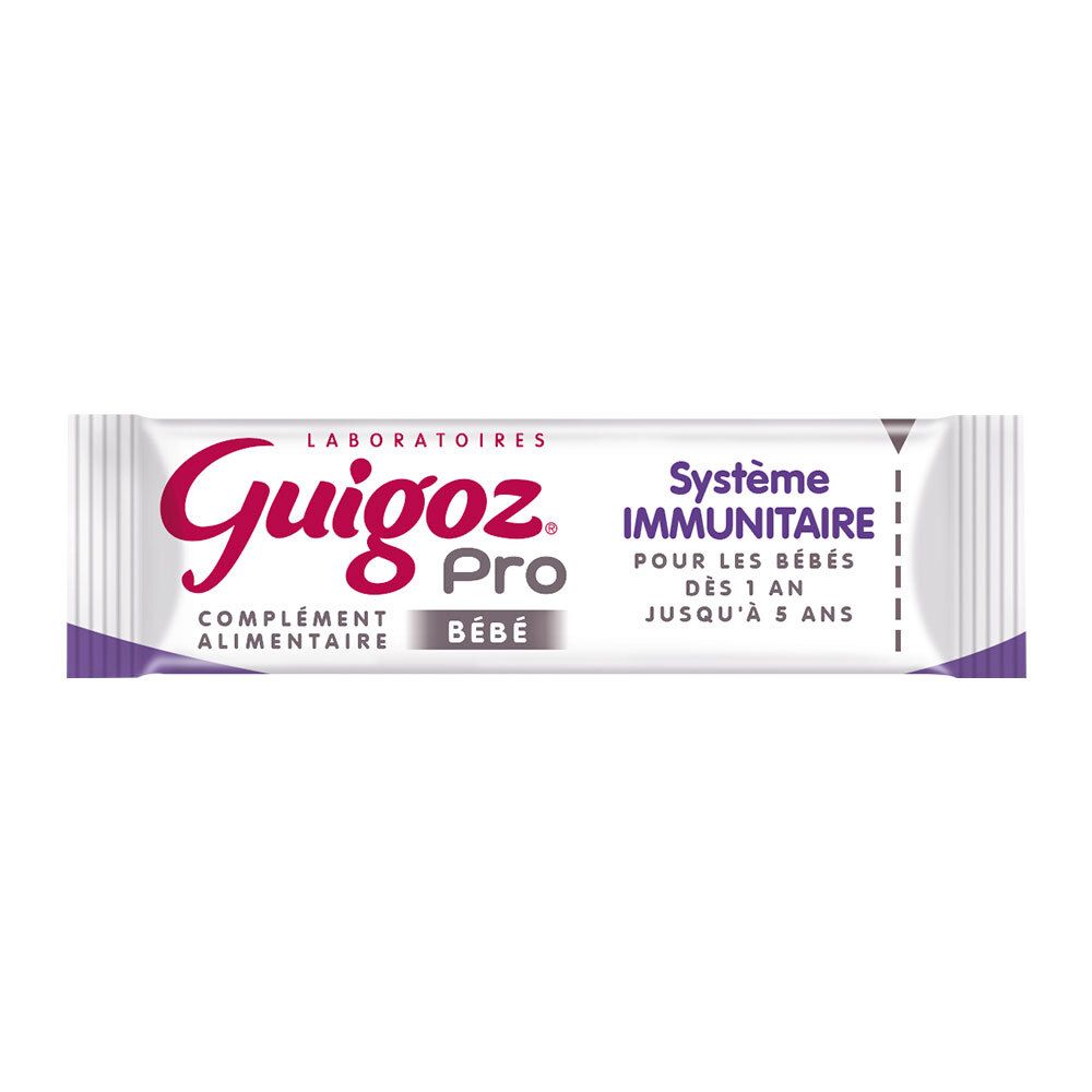 Sachet Guigoz Pro Bébé. Blanc avec accents violets. Texte: Guigoz Pro, Système Immunitaire. Pour bébés dès 1 an.