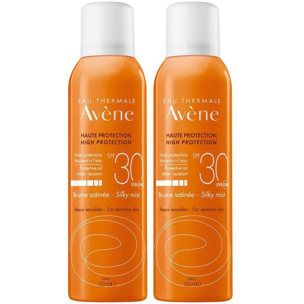 Zwei orangefarbene Sprühflaschen. Aufschrift: Eau Thermale Avène, Haute Protection, SPF 30, Brume satinée.