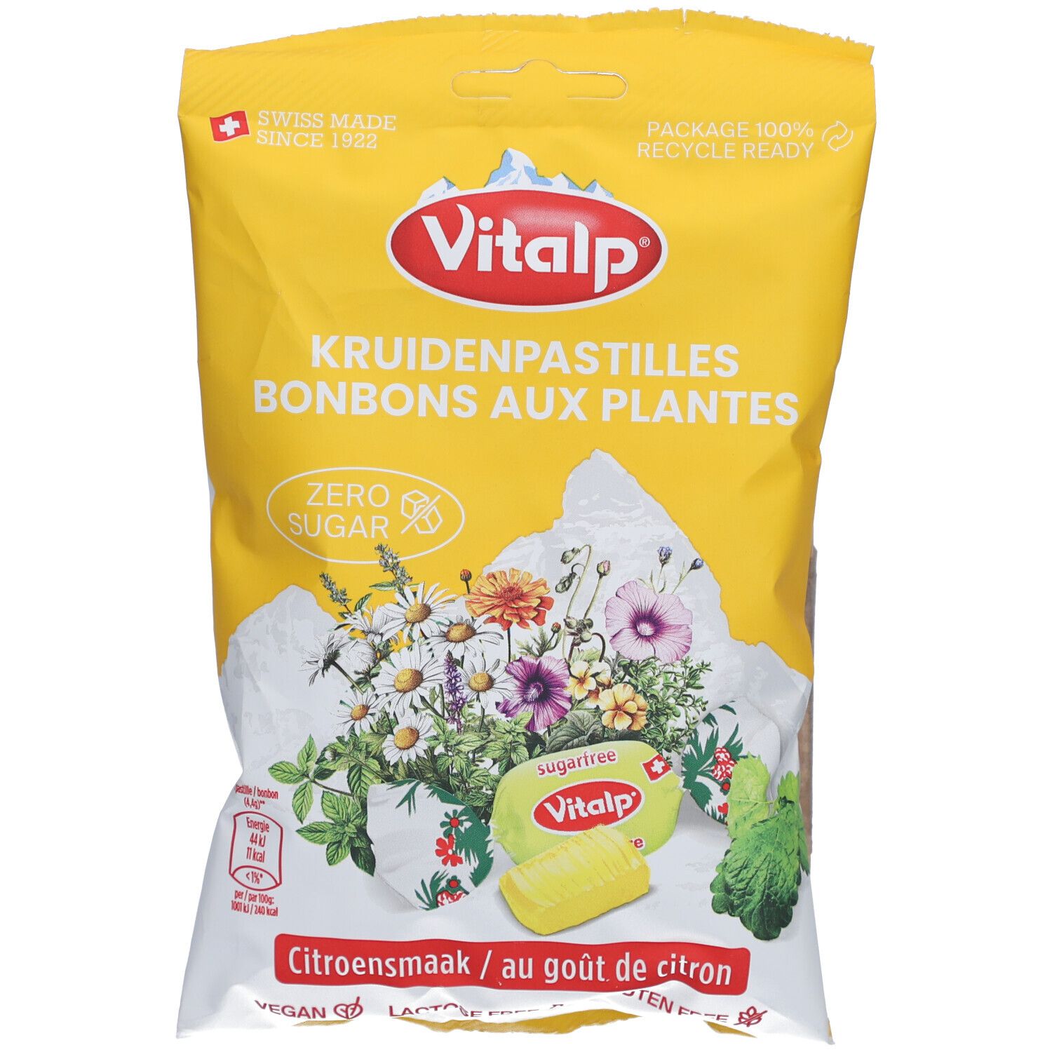 Gelbe Tüte mit VITALP-Logo und Aufschrift "Kruidenpastilles Bonbons aux Plantes". Abbildung von Kräutern und Blüten.