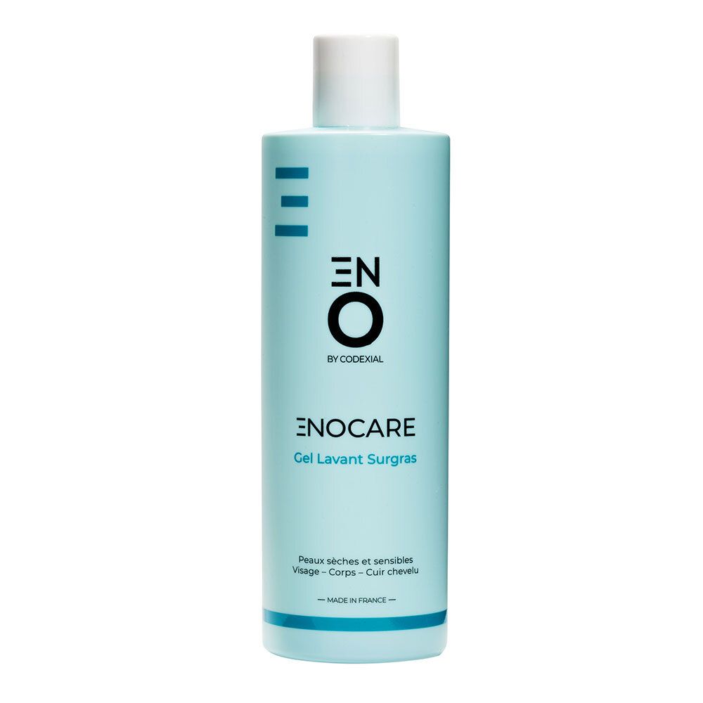 Gel lavant surgras bleu clair avec bouchon blanc. Inscription: ENO, ENOCARE. Pour peaux sèches et sensibles.