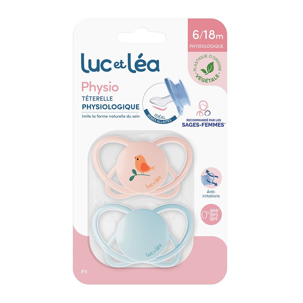 Zwei Schnuller in Verpackung. Rosa und blau. Aufdruck: Vogel. Marke: Luc et Léa. Altersempfehlung: 6/18m.